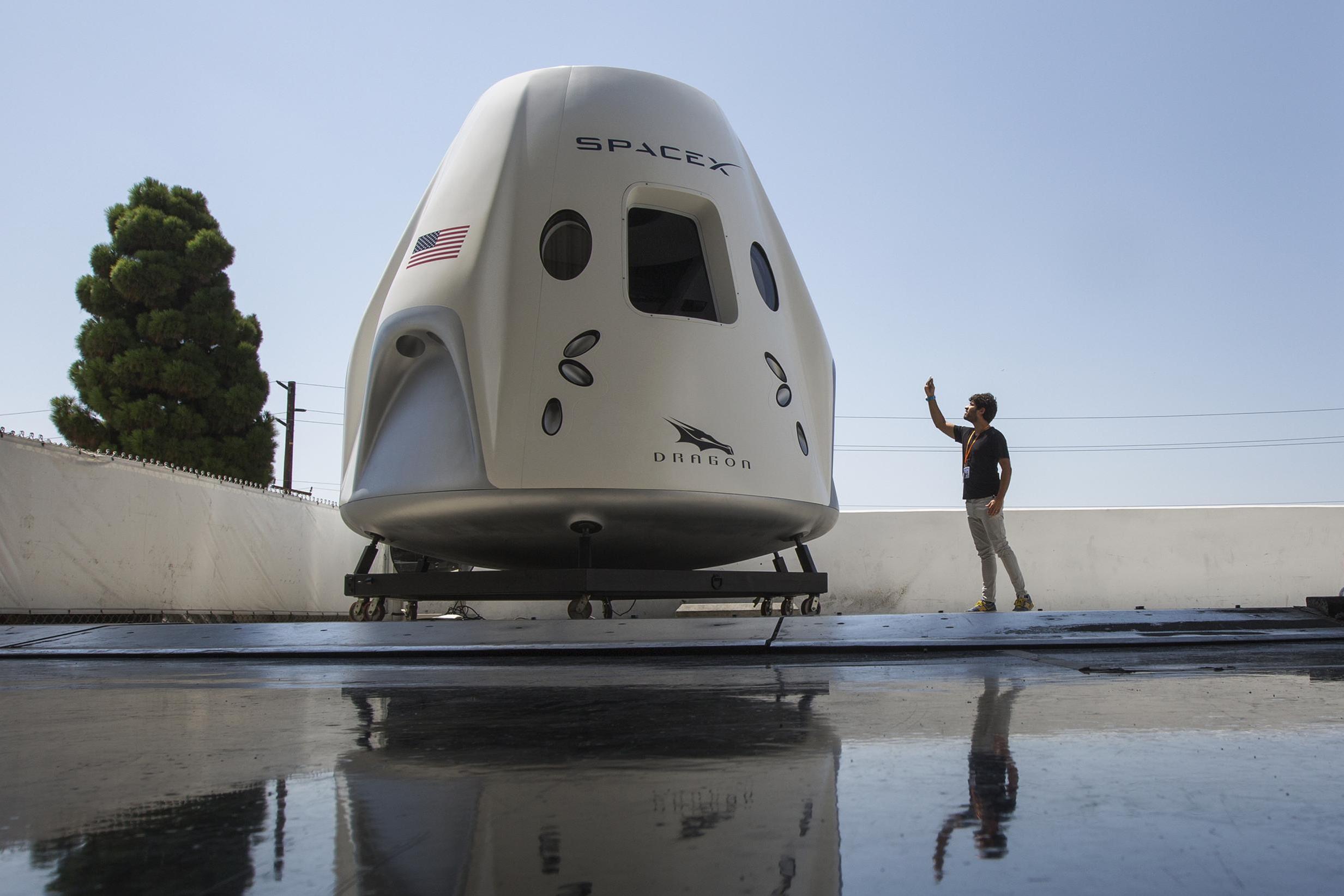 SpaceX aims to launch astronauts this spring after a successful escape test of its Crew Dragon reusable spacecraft (Getty)