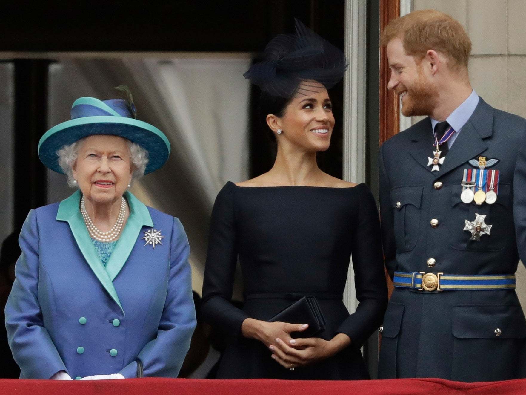 We are not amused: the Queen with the Duke and Duchess of Sussex