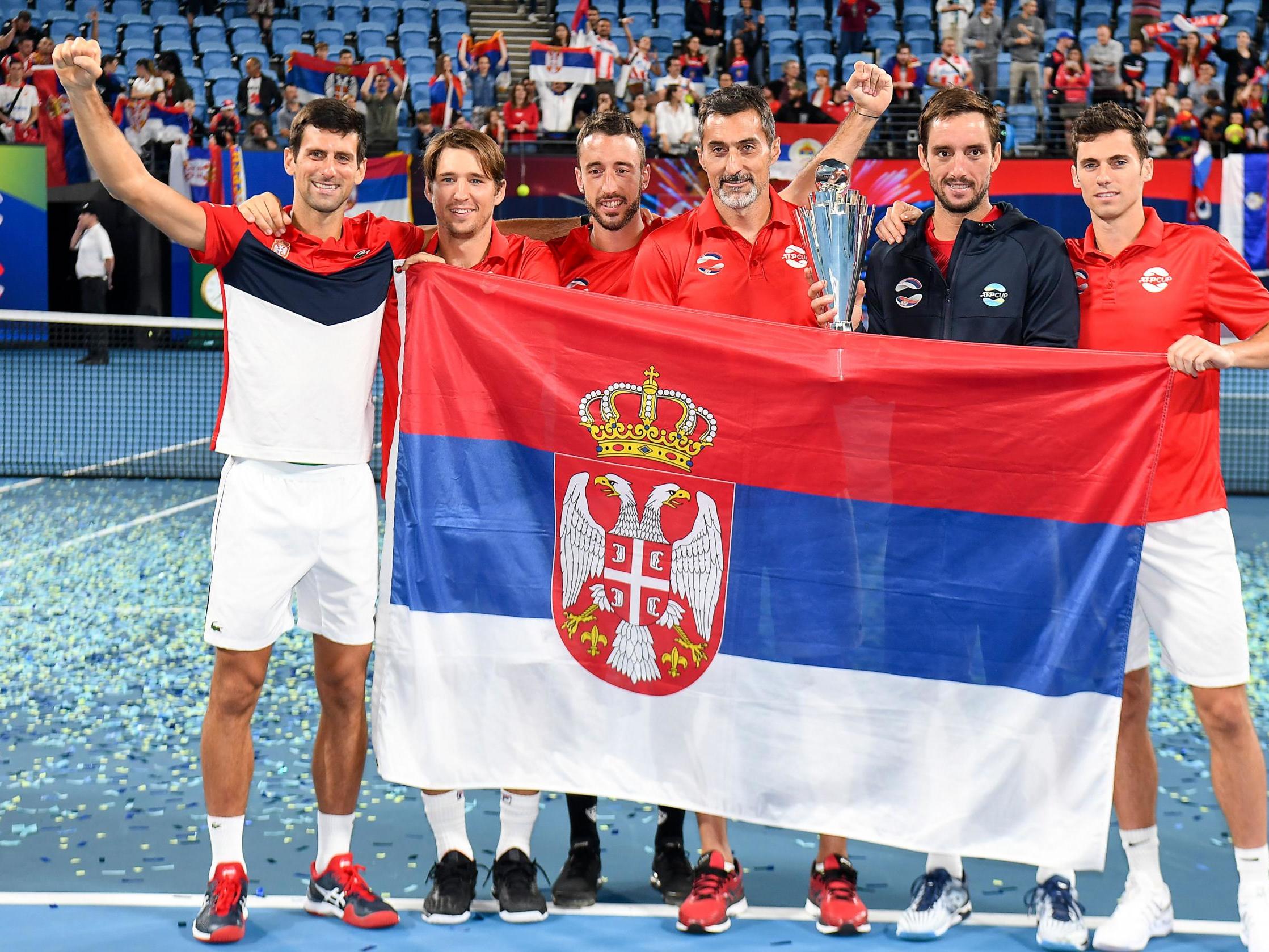 Novak Djokovic and his team celebrate victory in Sydney