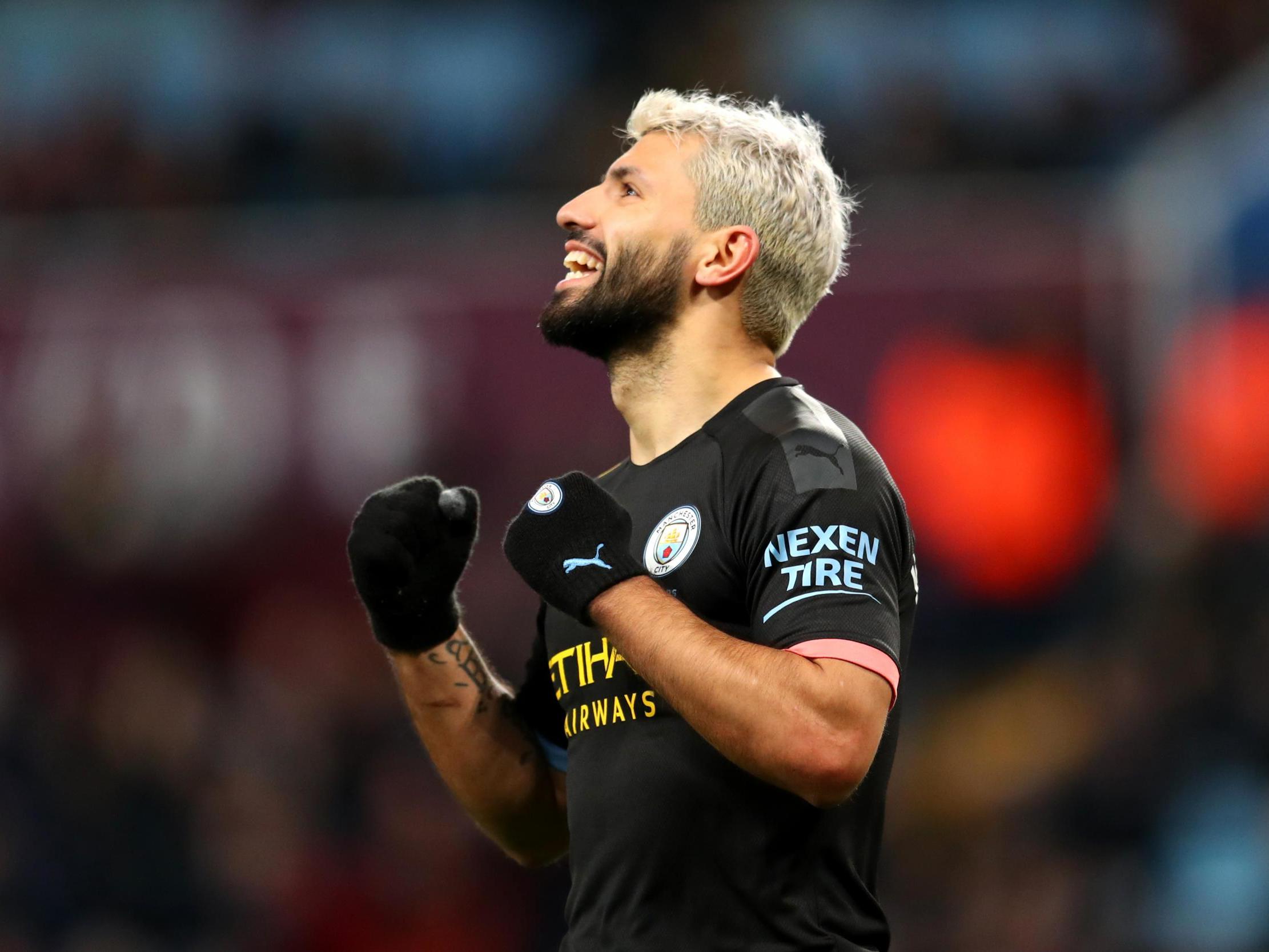 Sergio Aguero celebrates completing his hat-trick