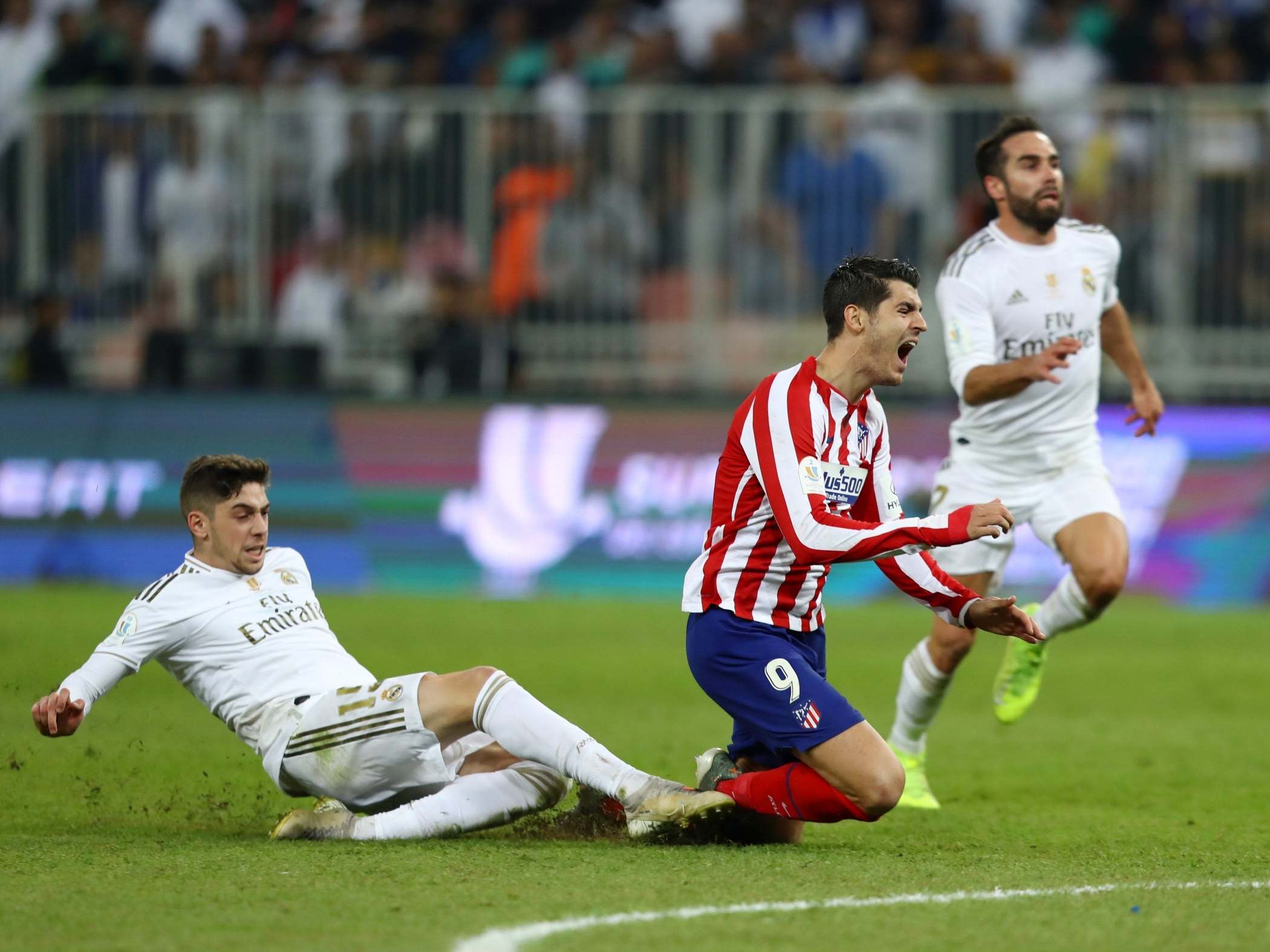 Federico Valverde tackles Alvaro Morata