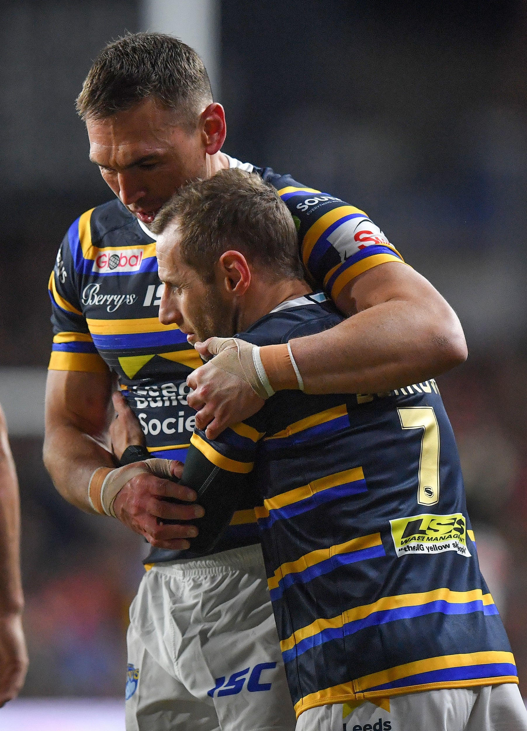 Leeds great Kevin Sinfield embraces Burrow as he came on for his final match