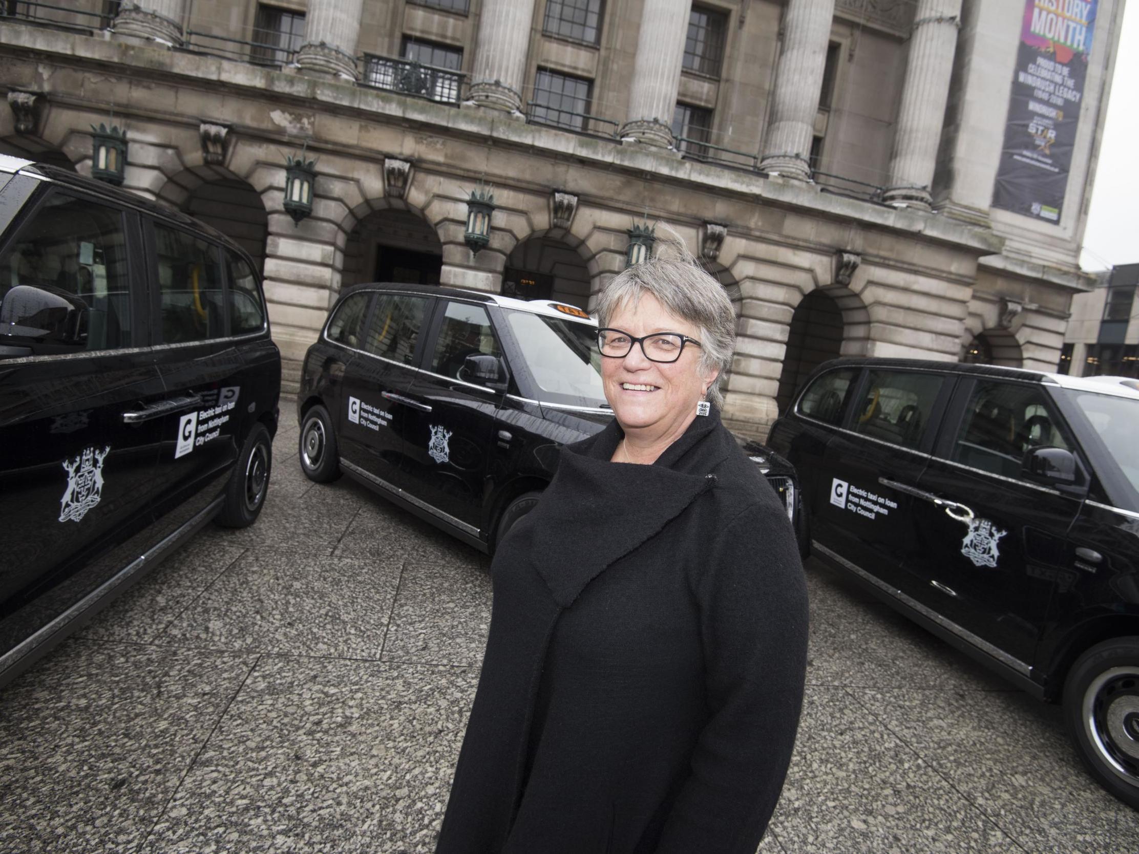 Councillor Sally Longford with Nottingham’s electrified taxi fleet