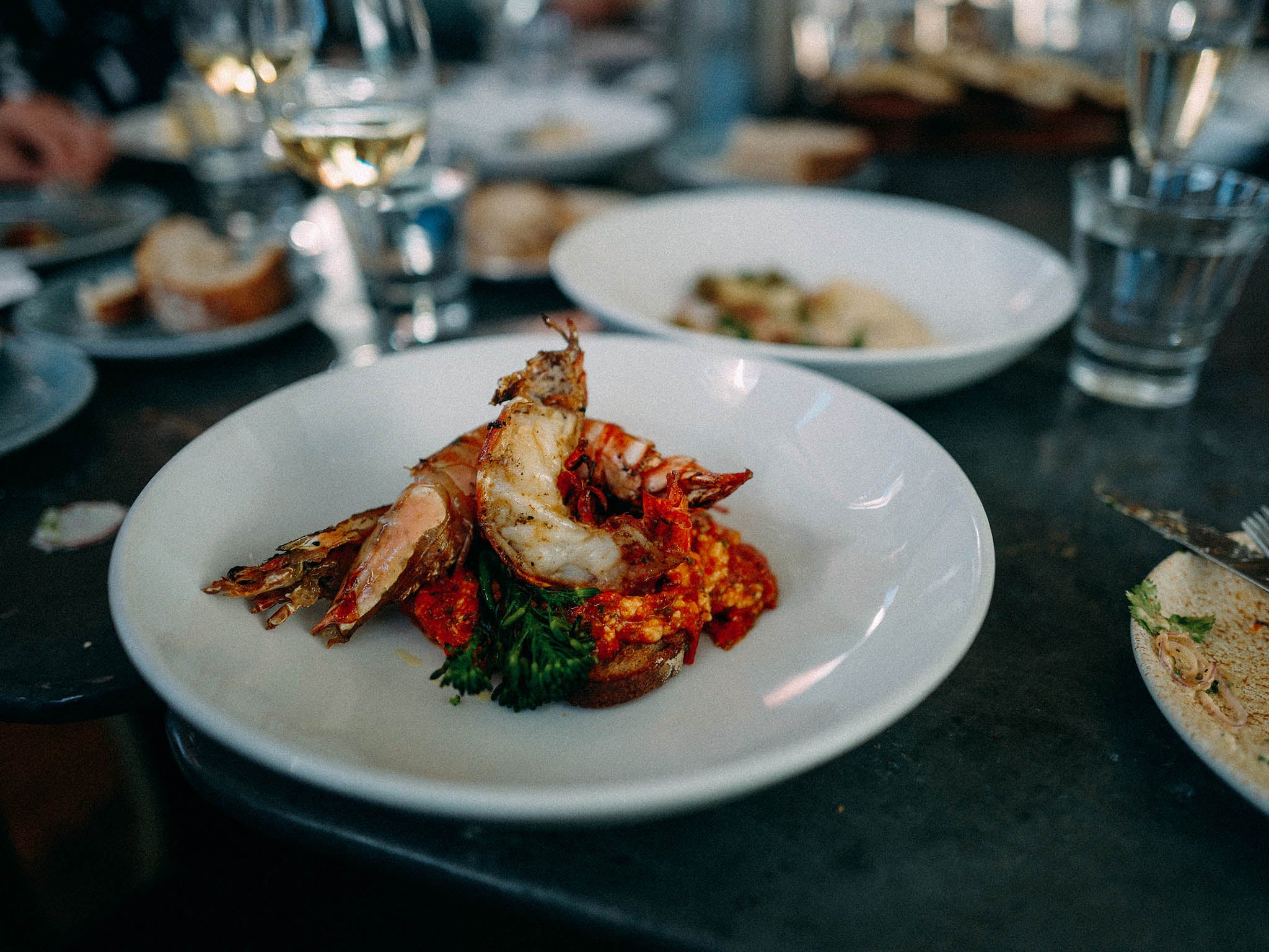 Grilled king tiger prawn, tomato, feta and ouzo saganaki