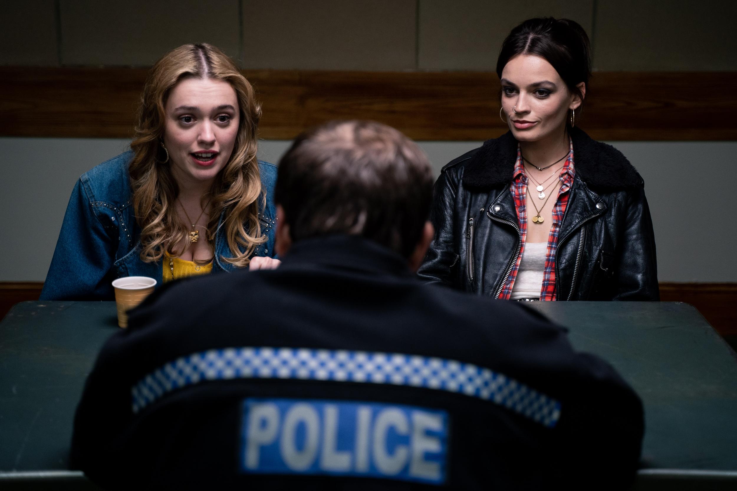 Aimee (Aimee Lou Wood) and Maeve (Emma Mackey) report a sexual assault to the police in ‘Sex Education’