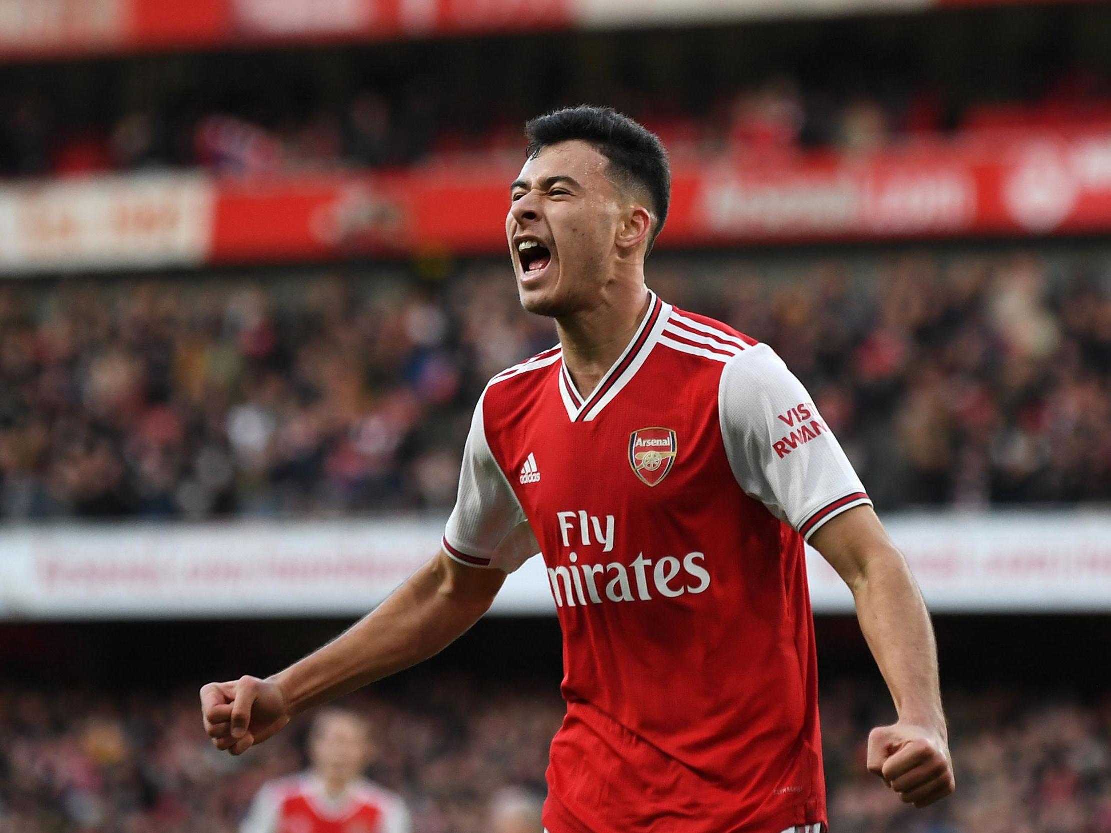 Martinelli celebrates scoring for Arsenal (AFP via Getty Images)