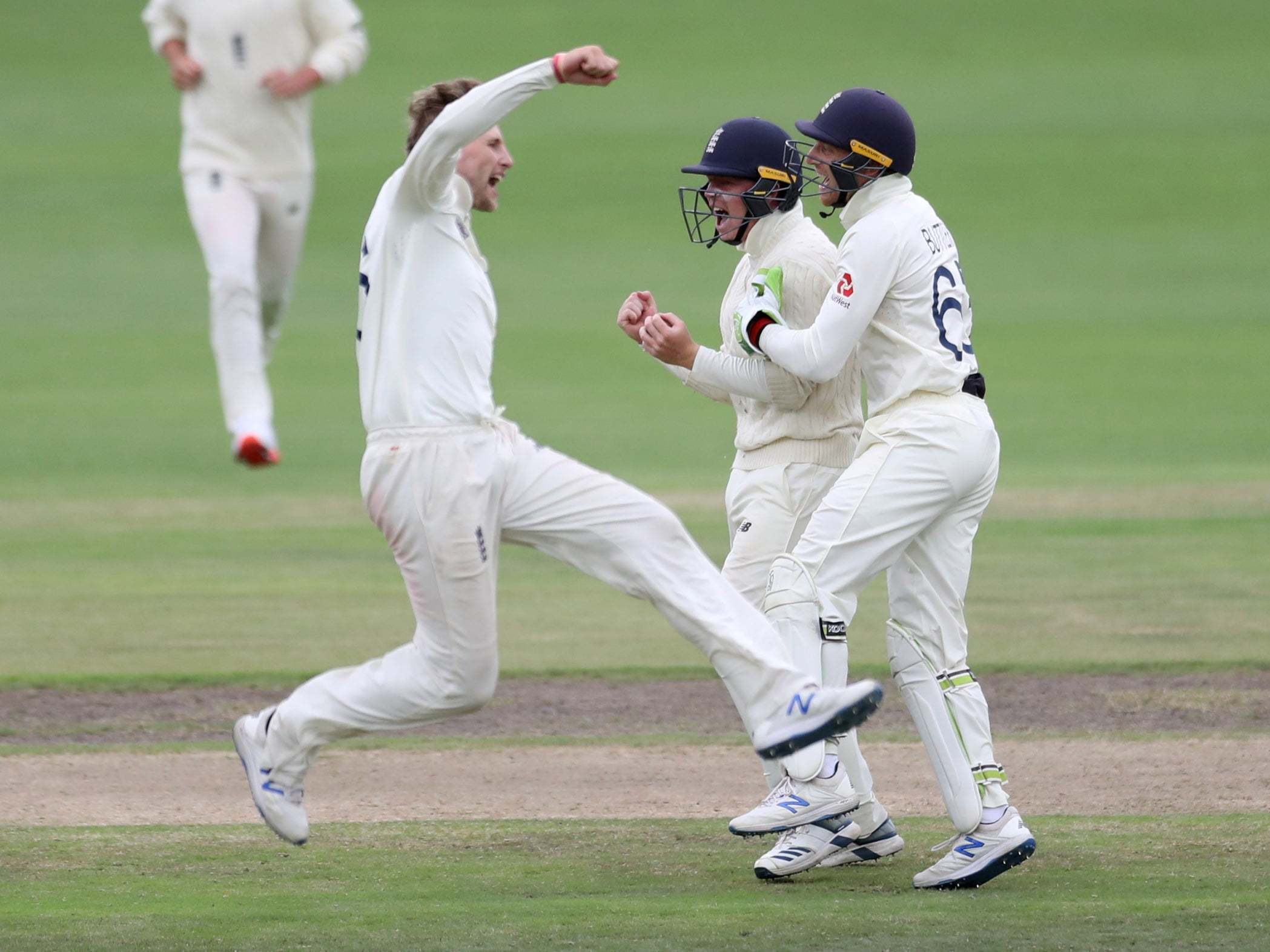 Joe Root celebrates taking the wicket of Rassie van der Dussen