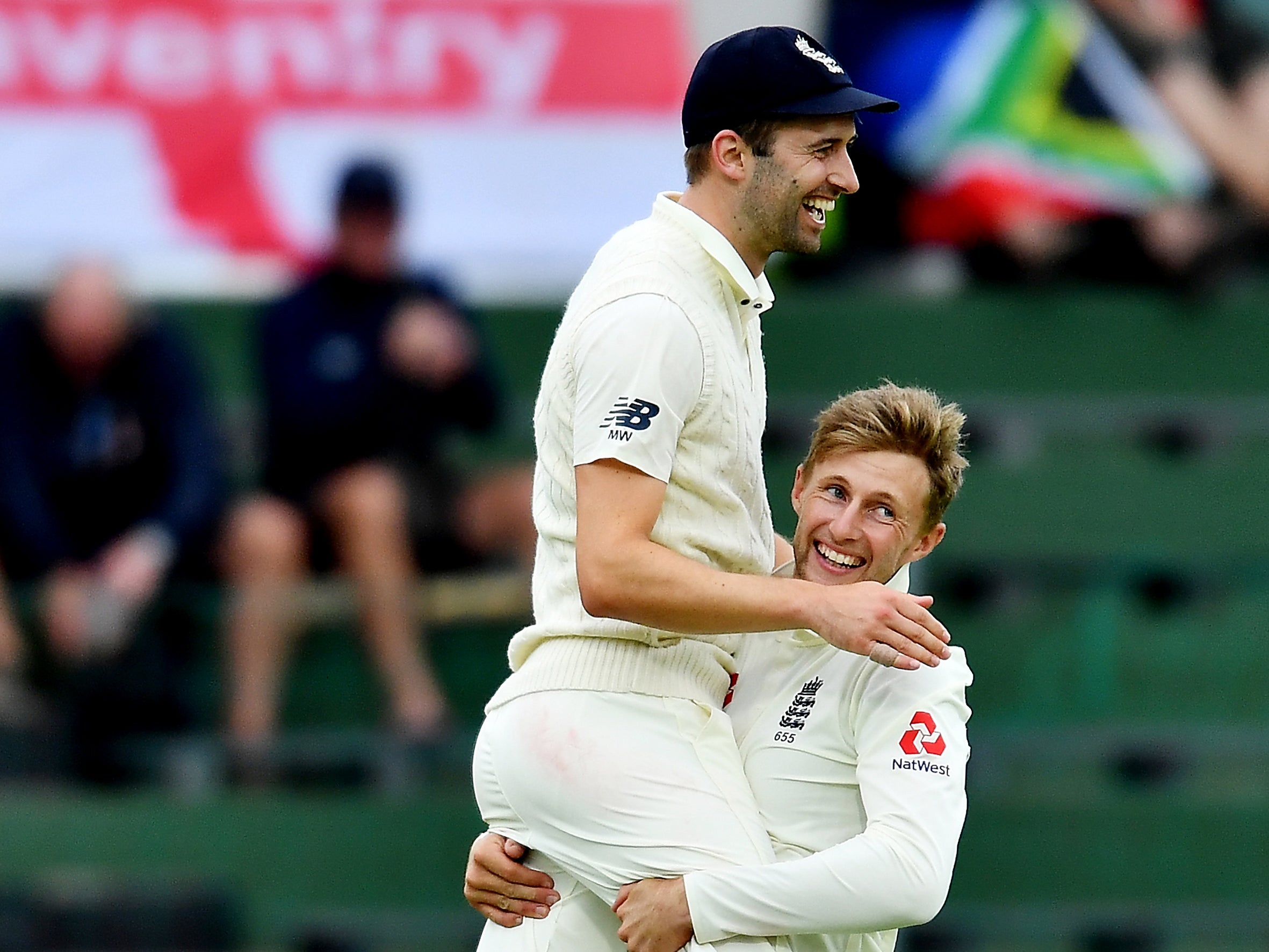 Mark Wood celebrates with Joe Root