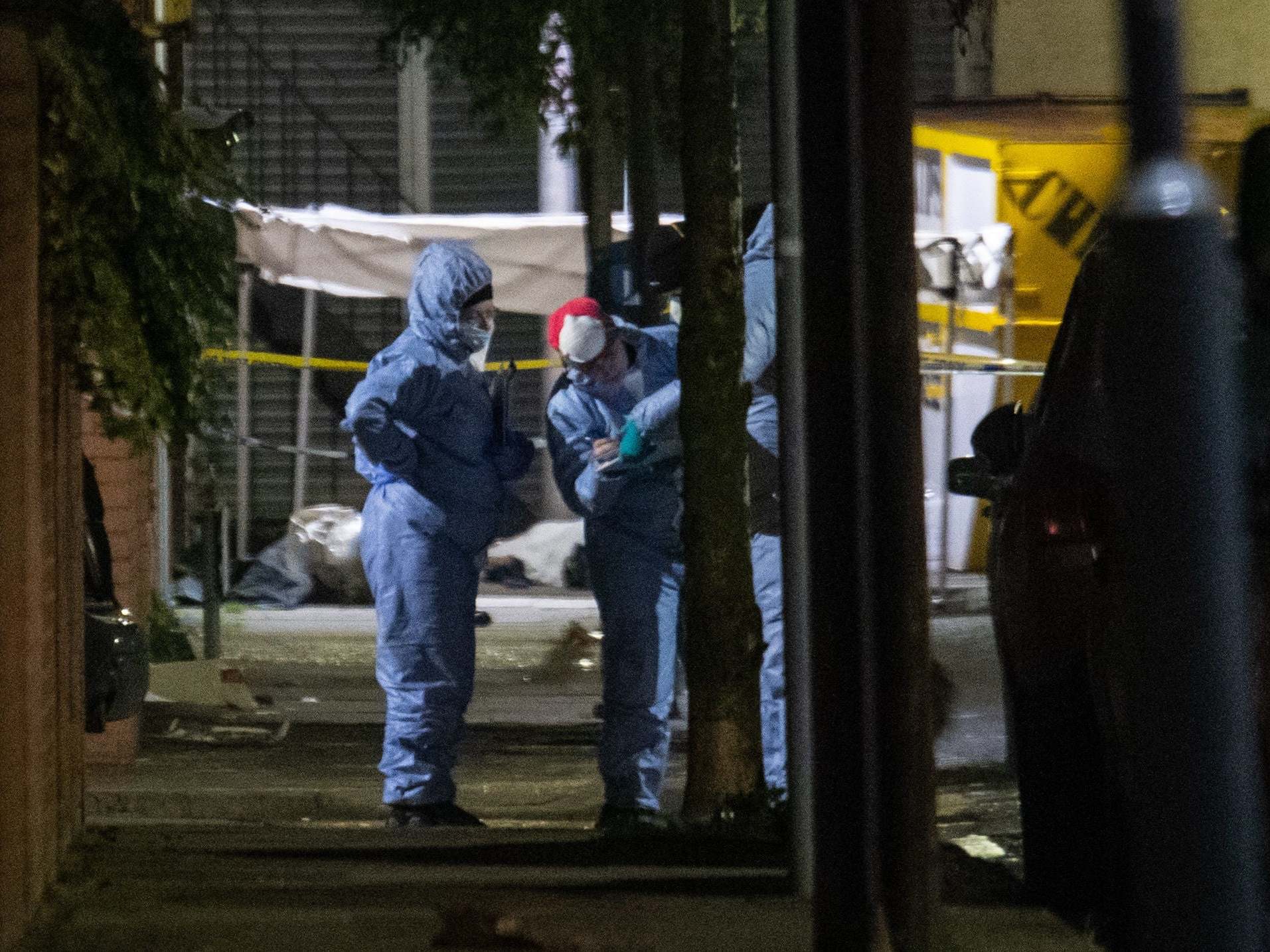 Forensics officers in Seven Kings, Ilford, after a multiple stabbing