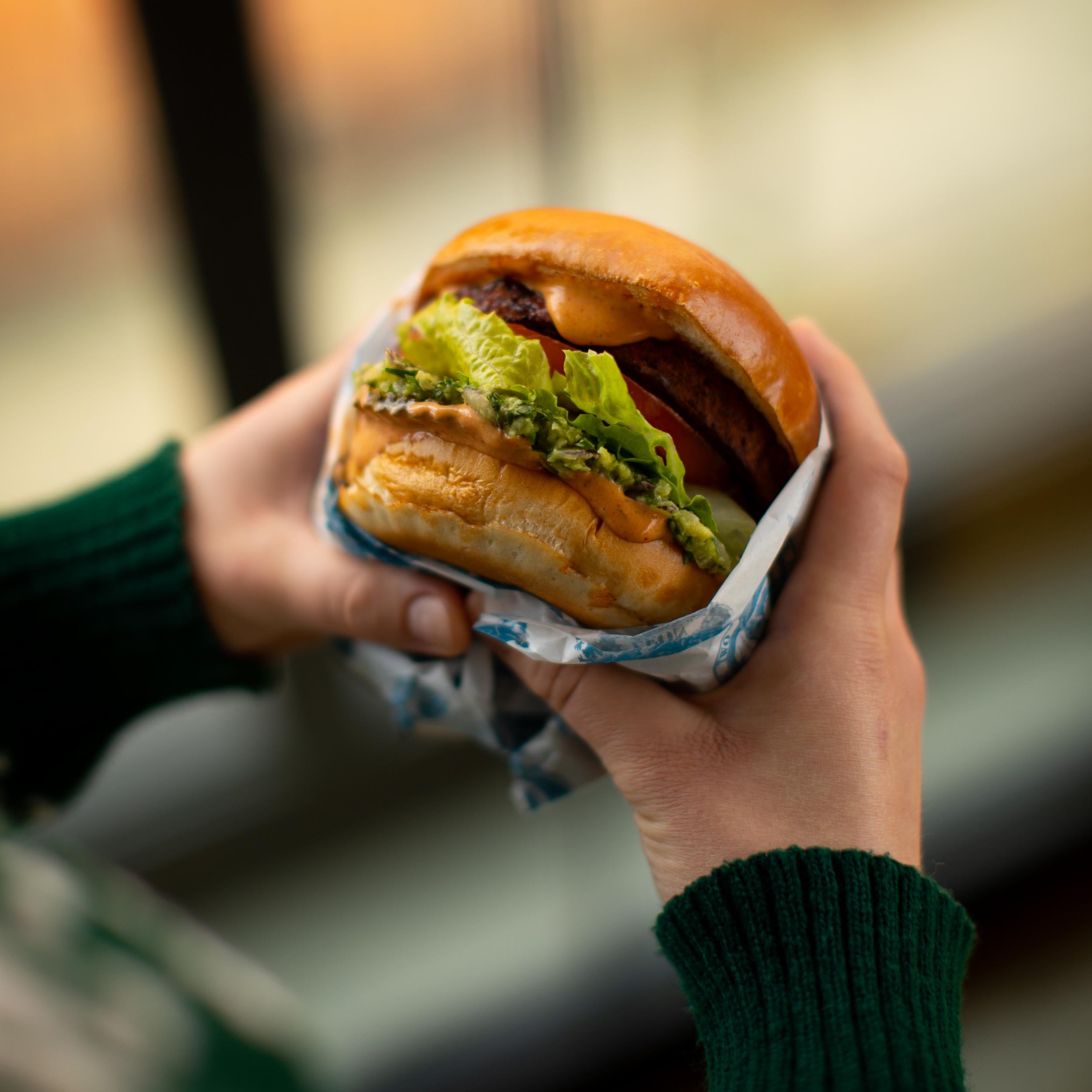 Leon's new chipotle and avocado burger is made with a vegan patty, smoky chipotle mayo, and freshly smashed guacamole.