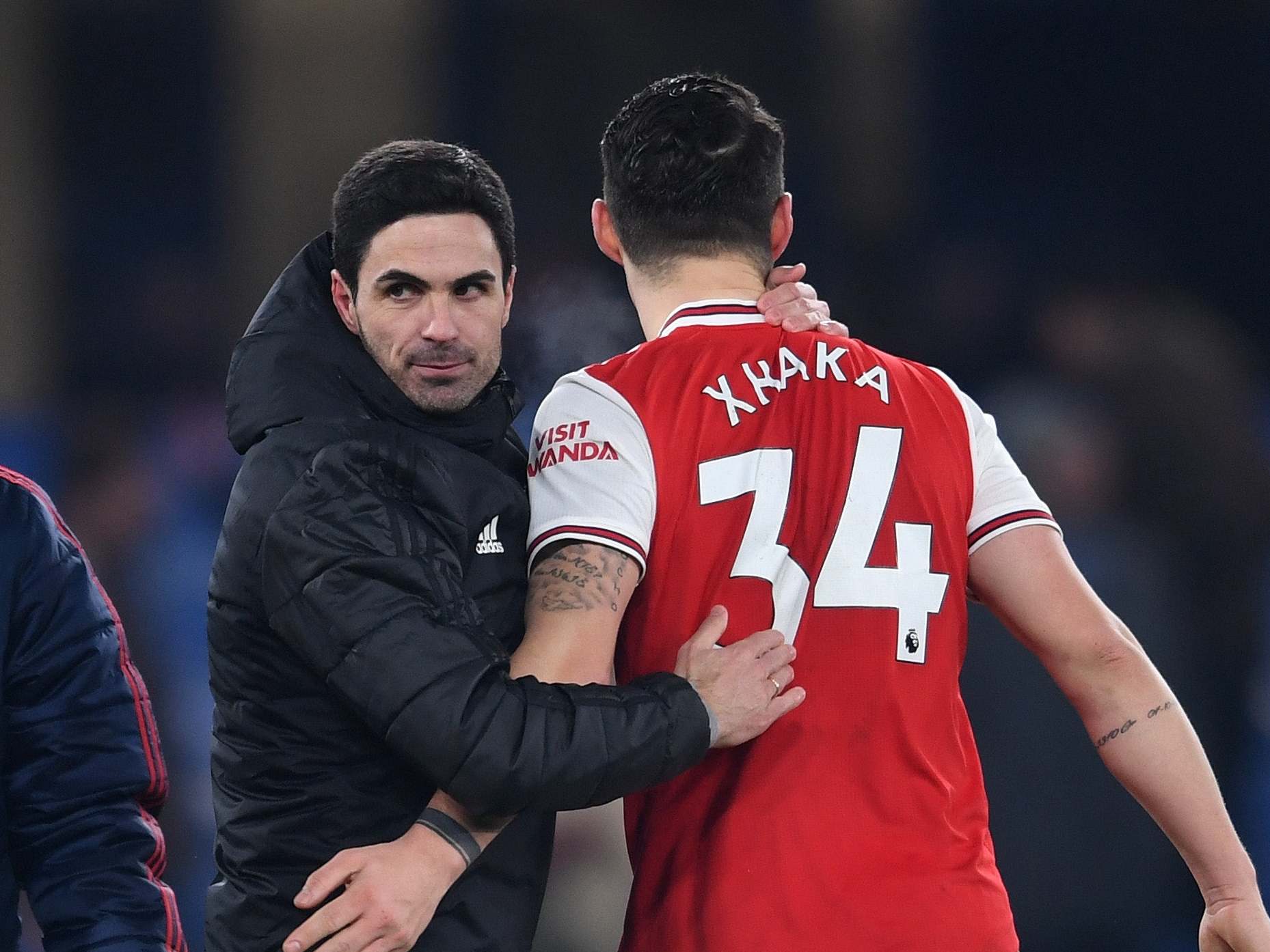 Arsenal head coach Mikel Arteta celebrates with Granit Xhaka