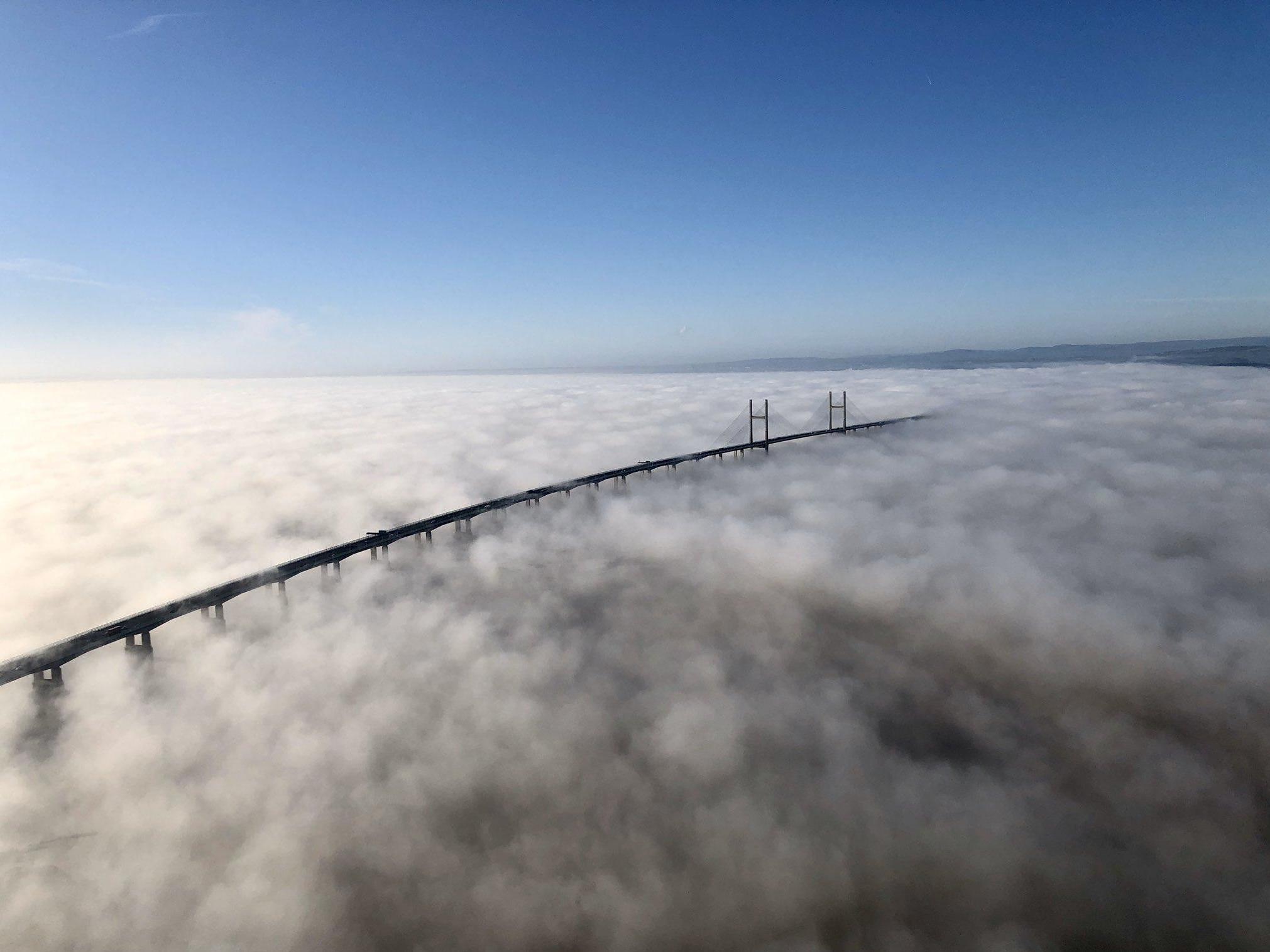 Aerial images captured by a National Police Air Service helicopter show the Severn Bridge, which links Wales and England, shrouded in fog, 21 January, 2020. The fog is believed to have been caused by a phenomenon known as temperature inversion.