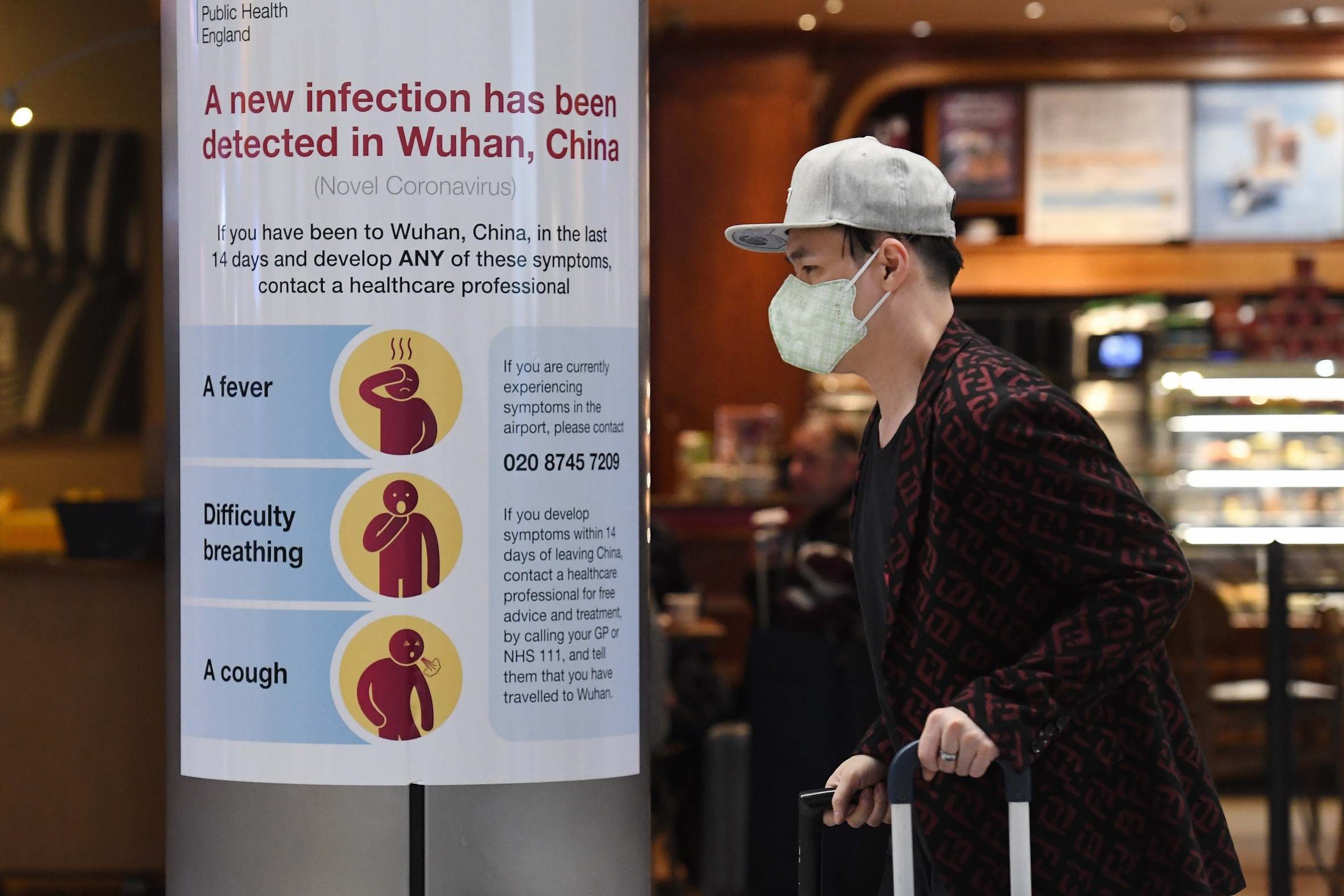 Warnings have been posted in airports across the world as the battle to contain the disease intensifies