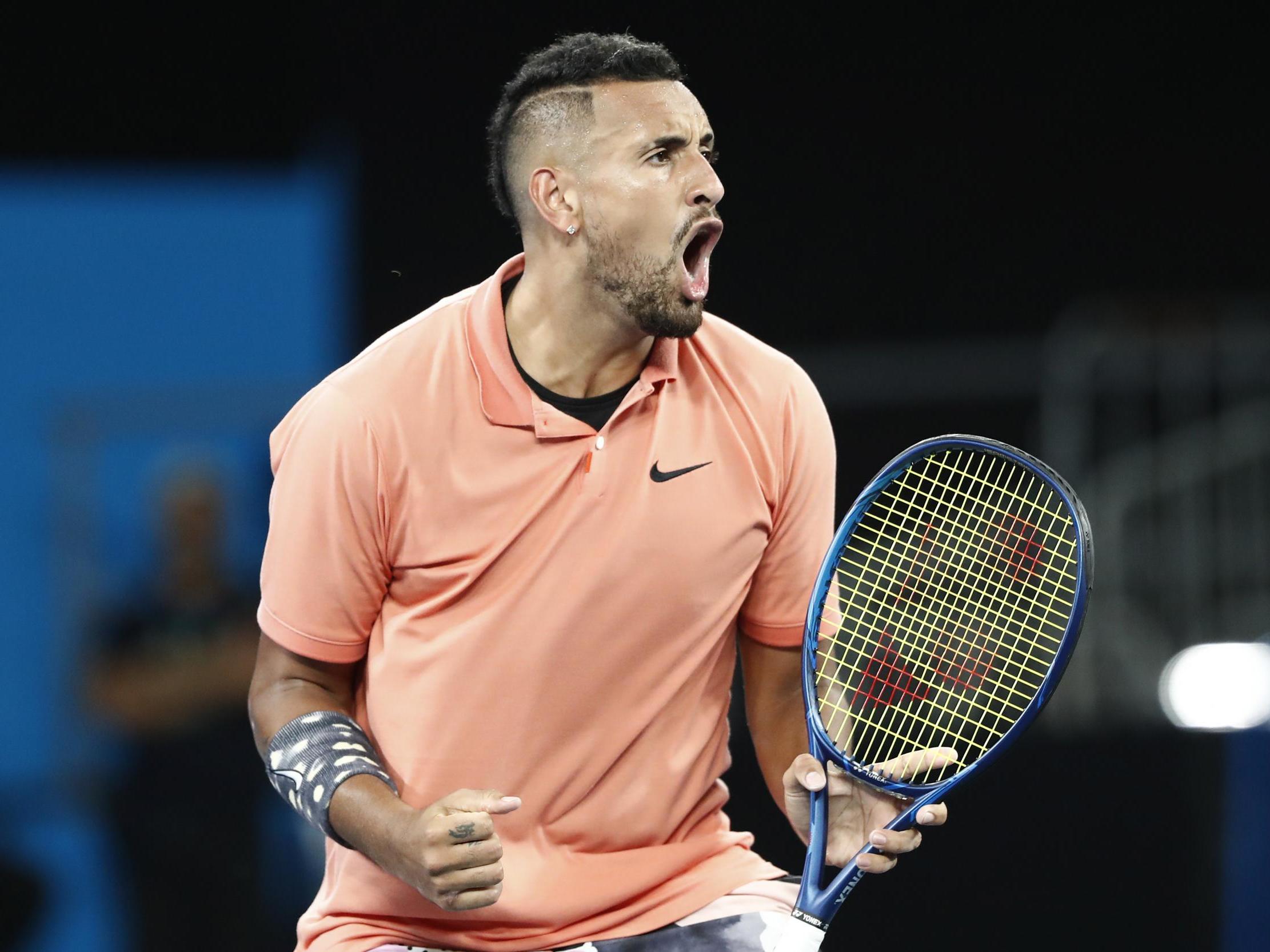 Nick Kyrgios celebrates his third-round victory