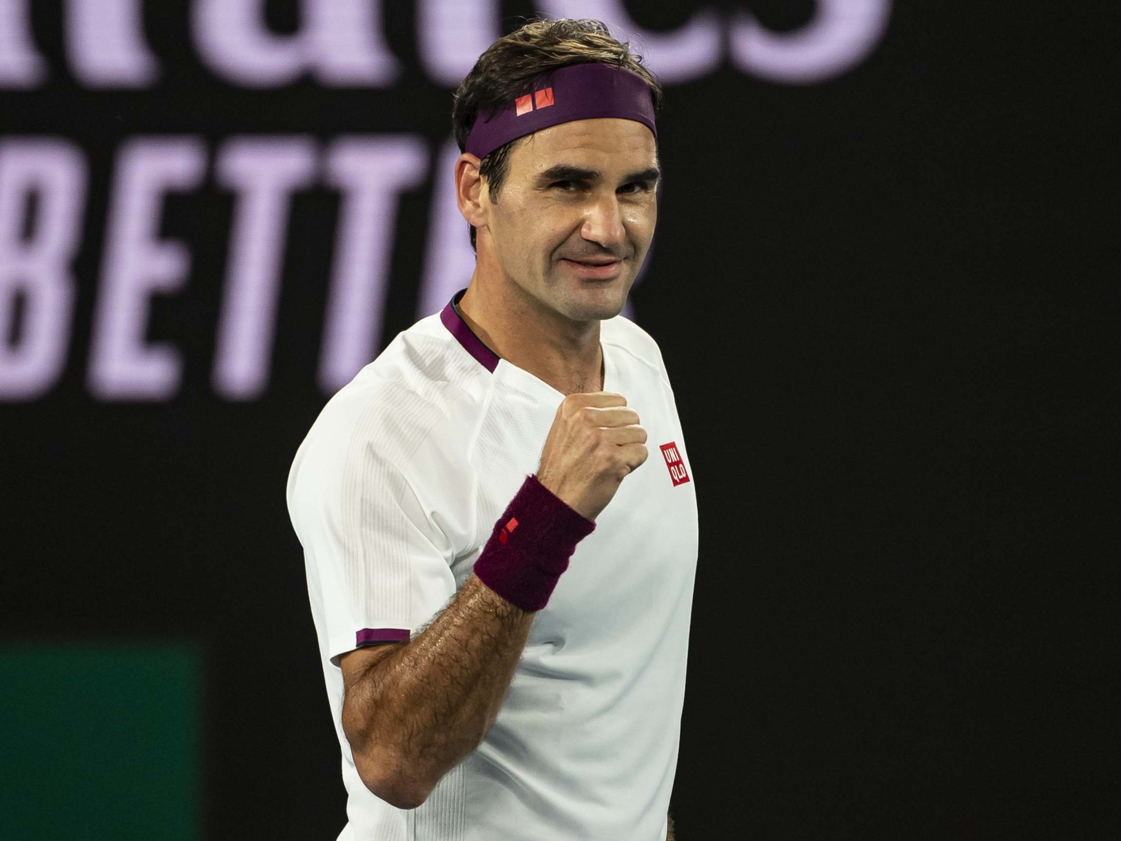 Roger Federer celebrates victory