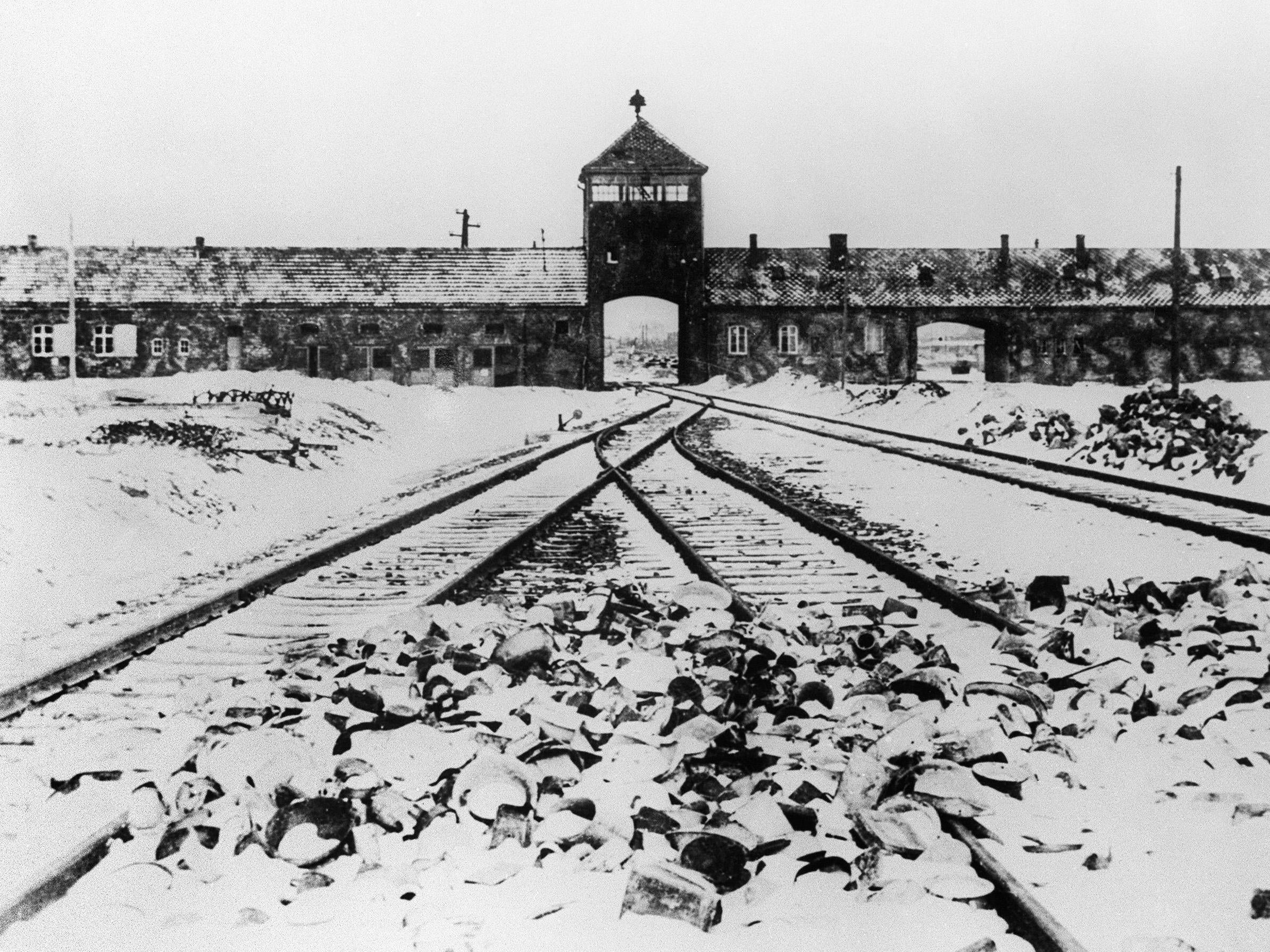 A picture taken in January 1945 shows Auschwitz concentration camp gate and railways after its liberation by Soviet troops(AFP/Getty Images)