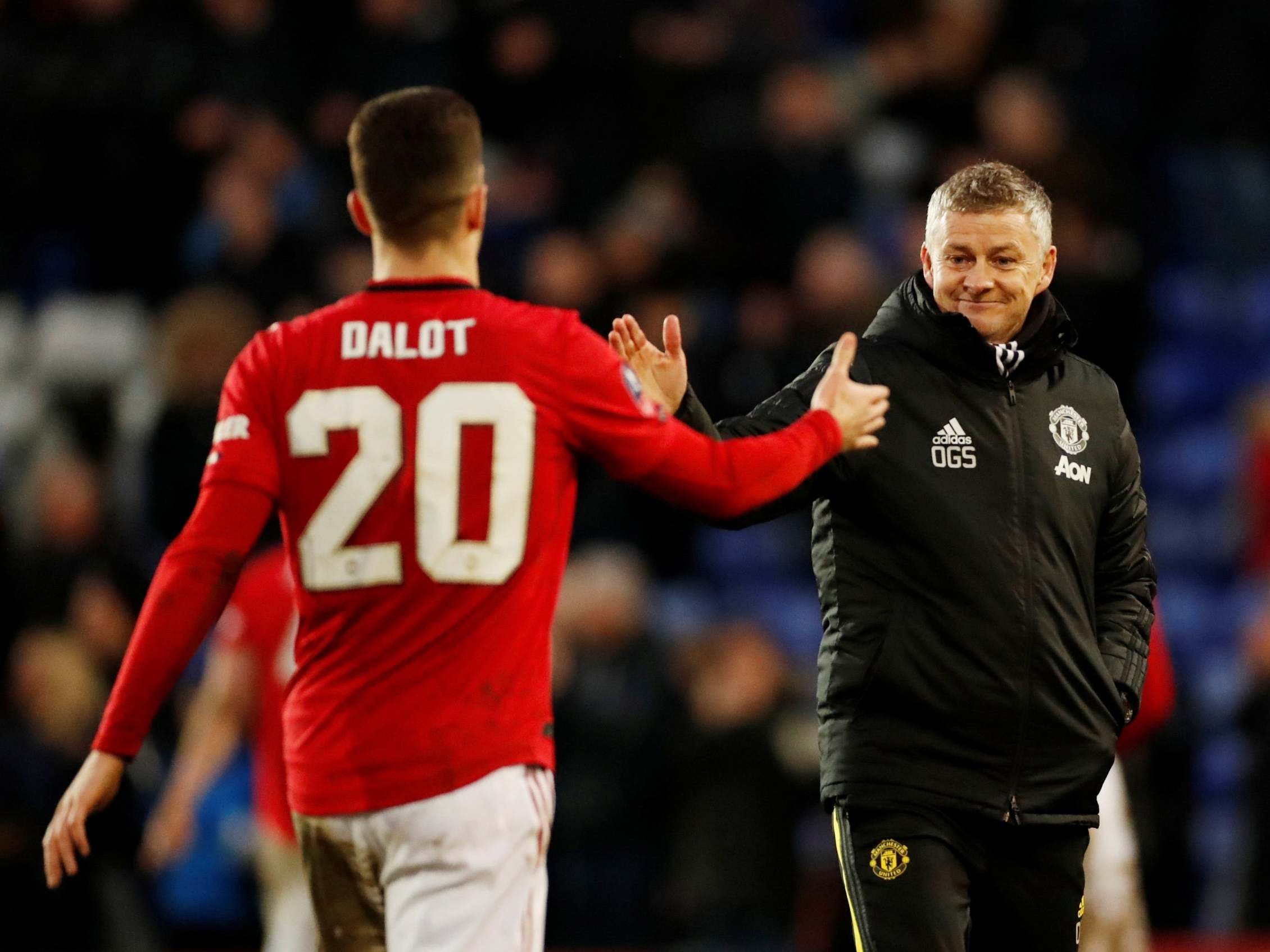 Ole Gunnar Solskjaer celebrates with Diogo Dalot