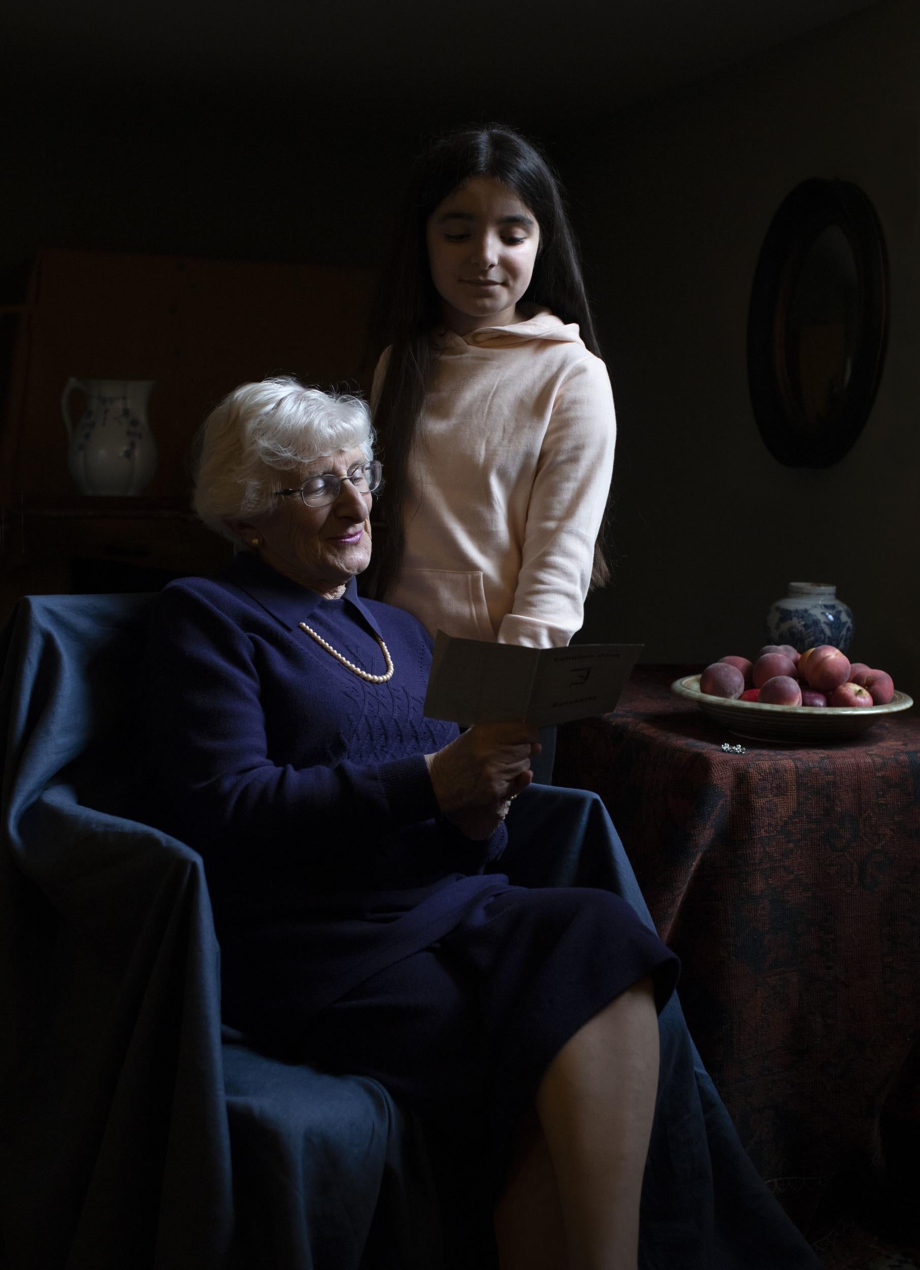 Yvonne Bernstein, 82, is photographed with her granddaughter Chloe Wright, aged 11 (PA)