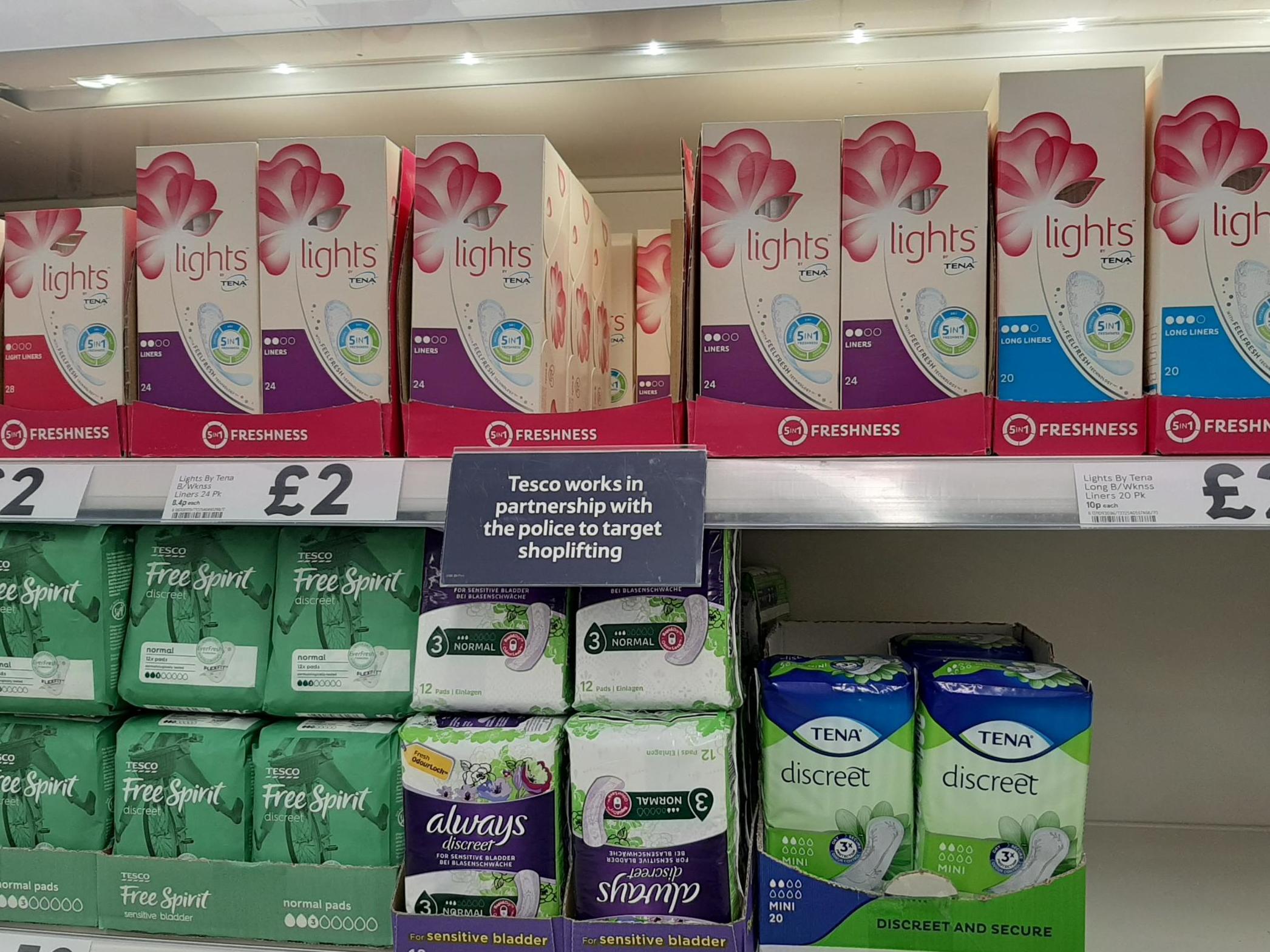 Anti-stealing sign in sanitary product section of a Kensington Tesco