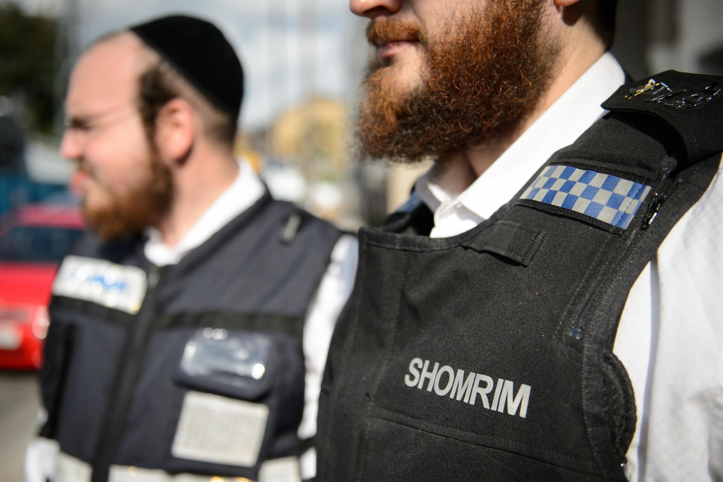 Shomrim is often praised for its interactions with community members and police (AFP)