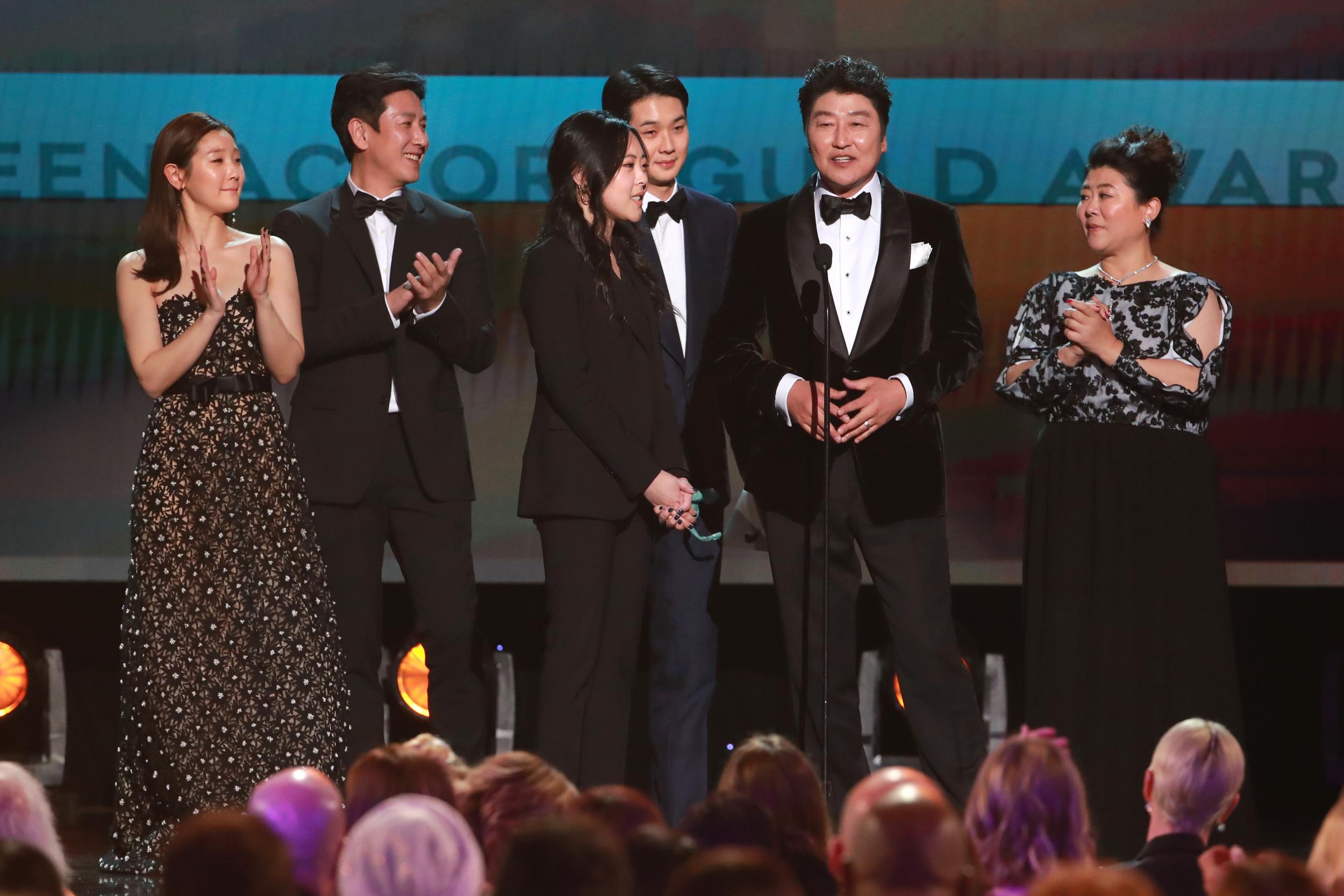 The ‘Parasite’ cast accepting the SAG Award for Outstanding Performance by a Cast in a Motion Picture