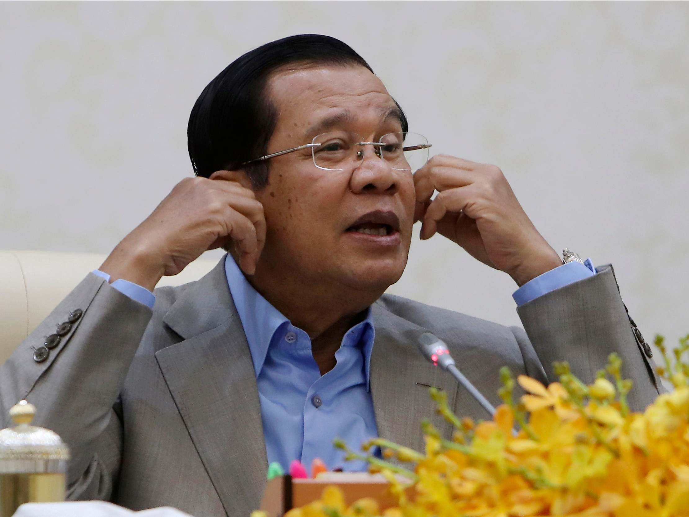 Cambodia's Prime Minister Hun Sen gestures during a speech