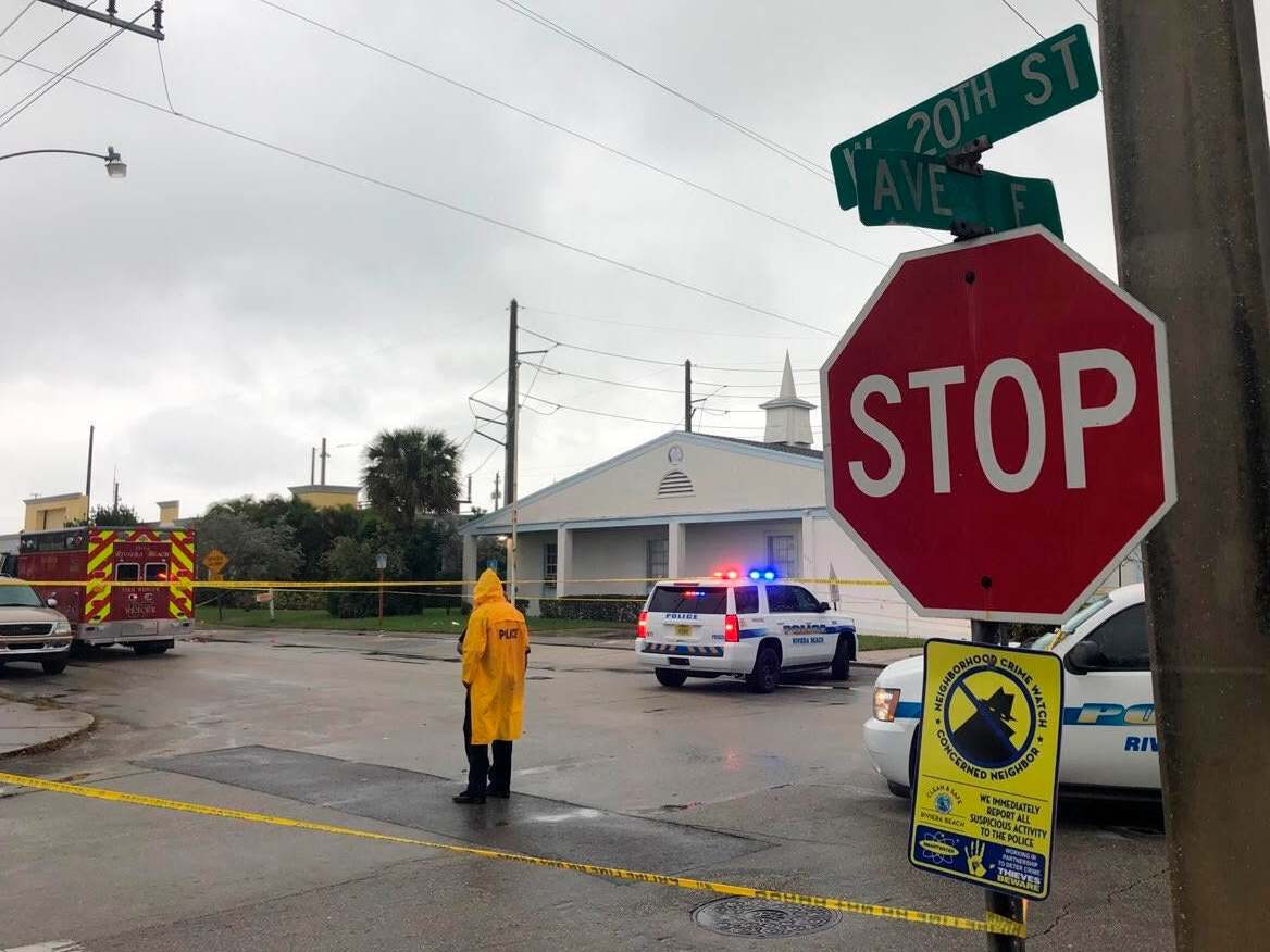 Police at the scene of the shooting outside Victory City Church in Riviera beach