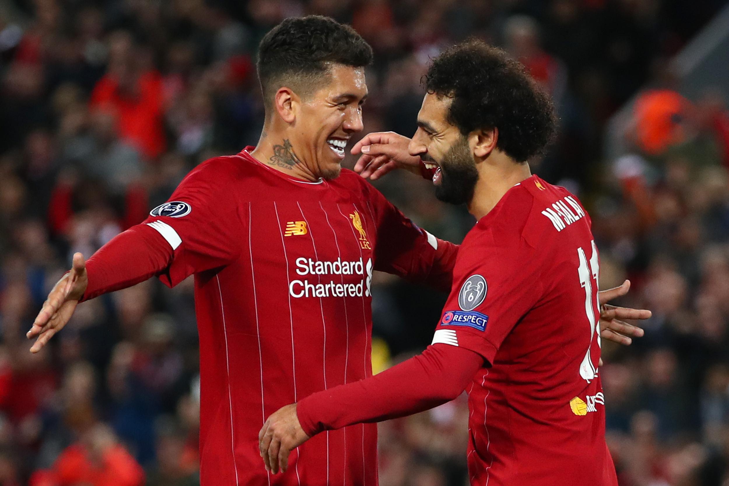 Salah and Firmino celebrate