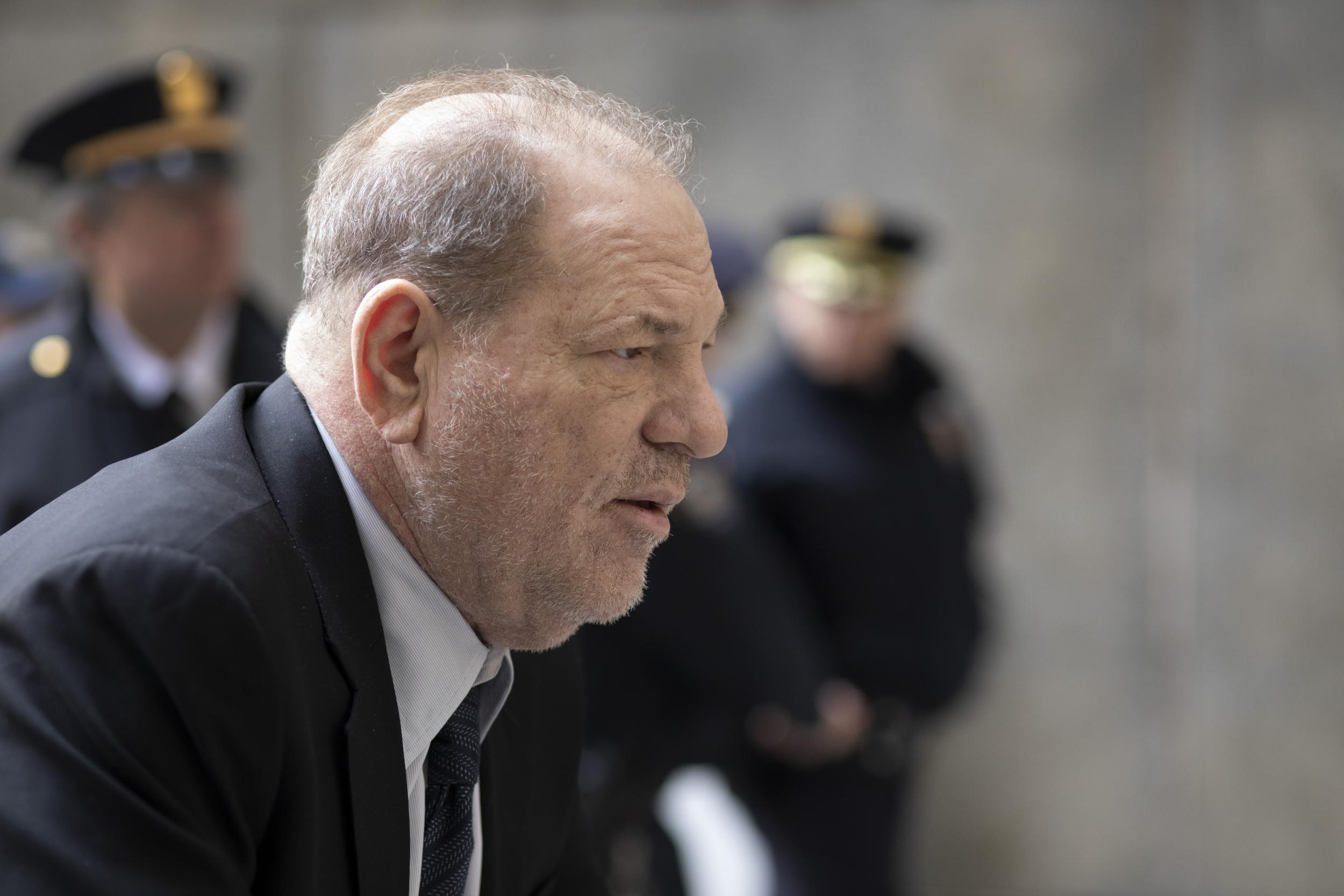 Weinstein arrives at court for trial (AP Photo/Mark Lennihan)