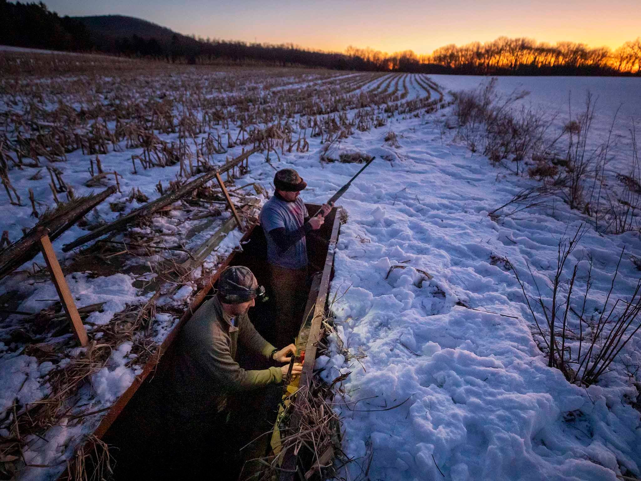 Hunters set up their sunken blind in the Middle Creek Wildlife Management Area in Stevens, Pennsylvania