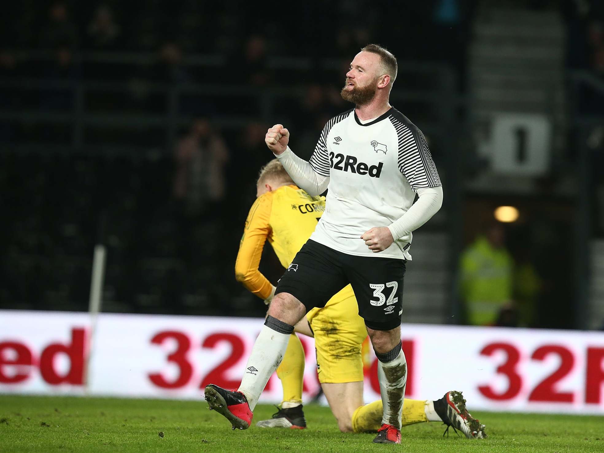 Wayne Rooney celebrates after scoring from the spot