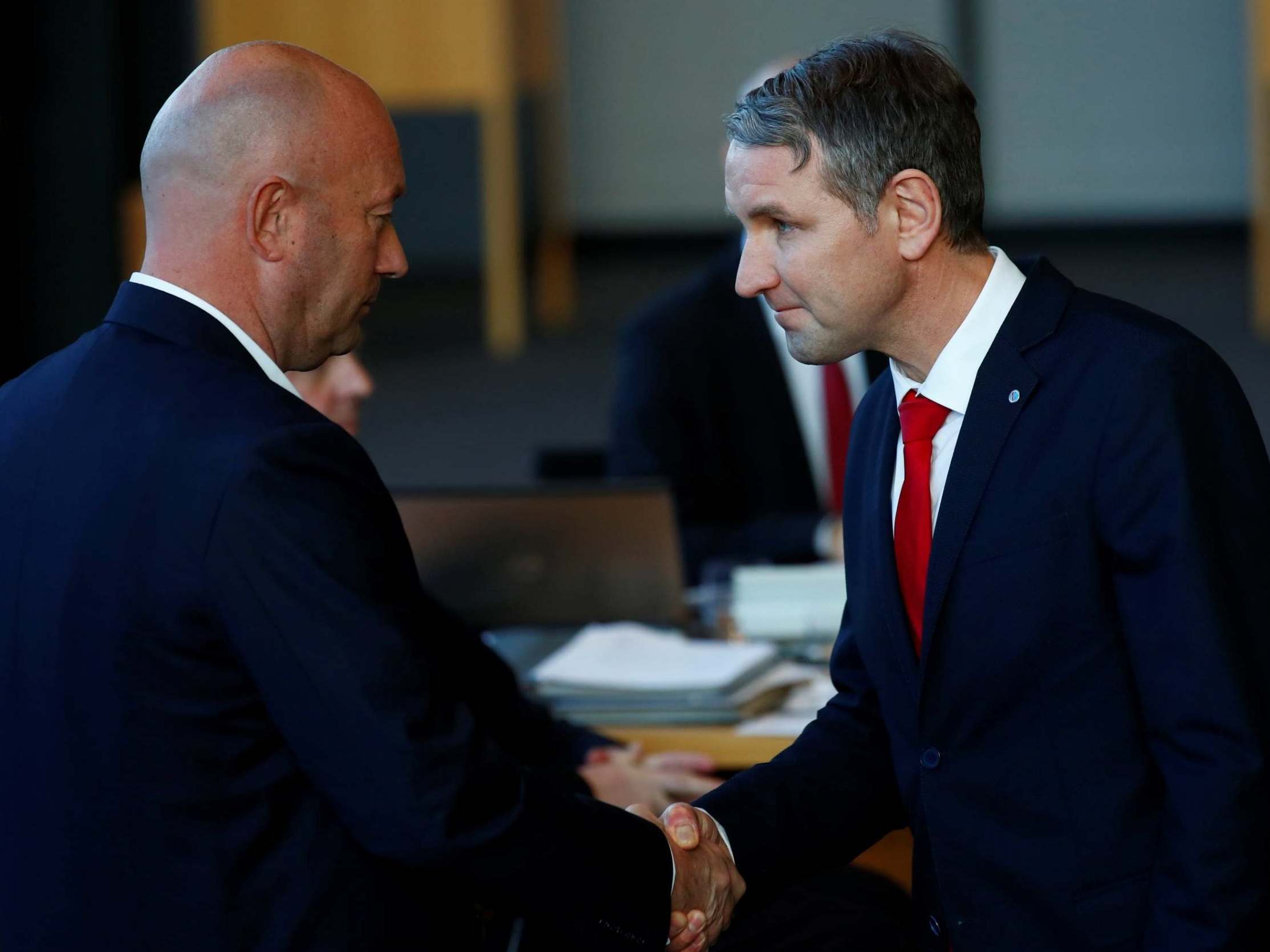 Bjoern Hoecke, Alternative for Germany (AfD) party leader congratulates Free Democratic Party (FDP) candidate Thomas Kemmerich after backing him to lead the Thuringian state government (Reuters)