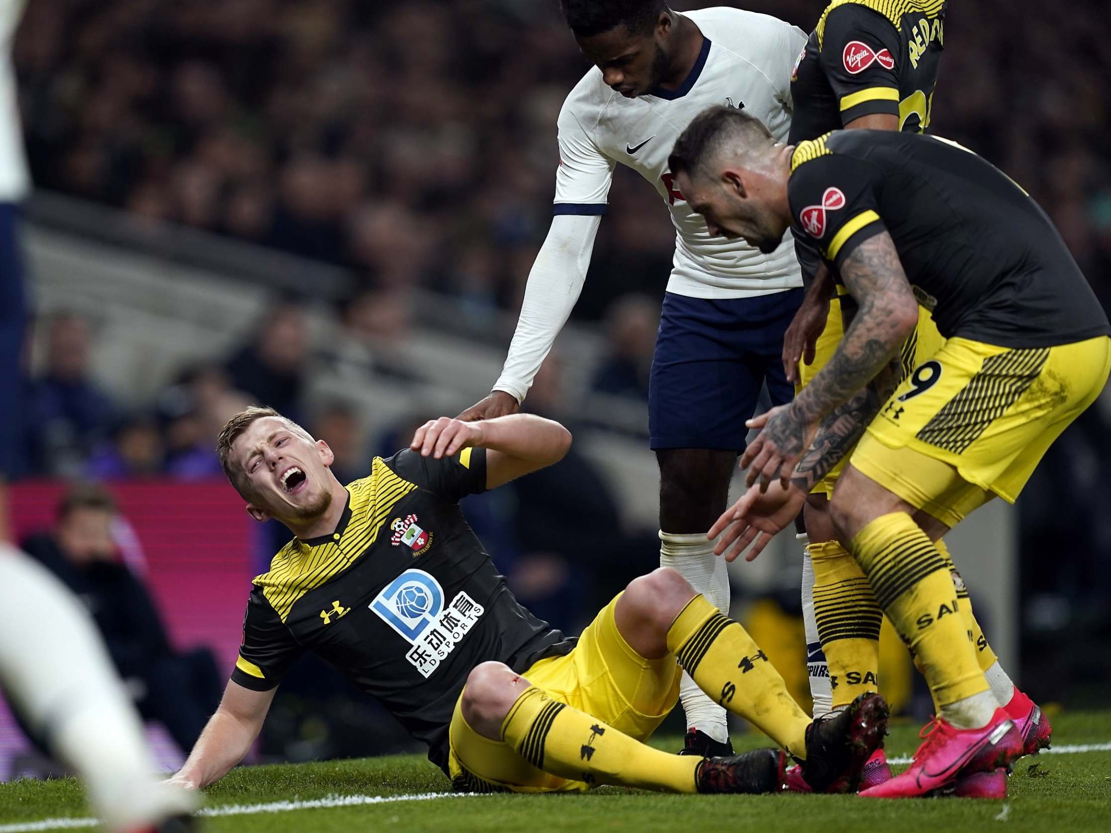 Ward-Prowse reacts after picking up the injury