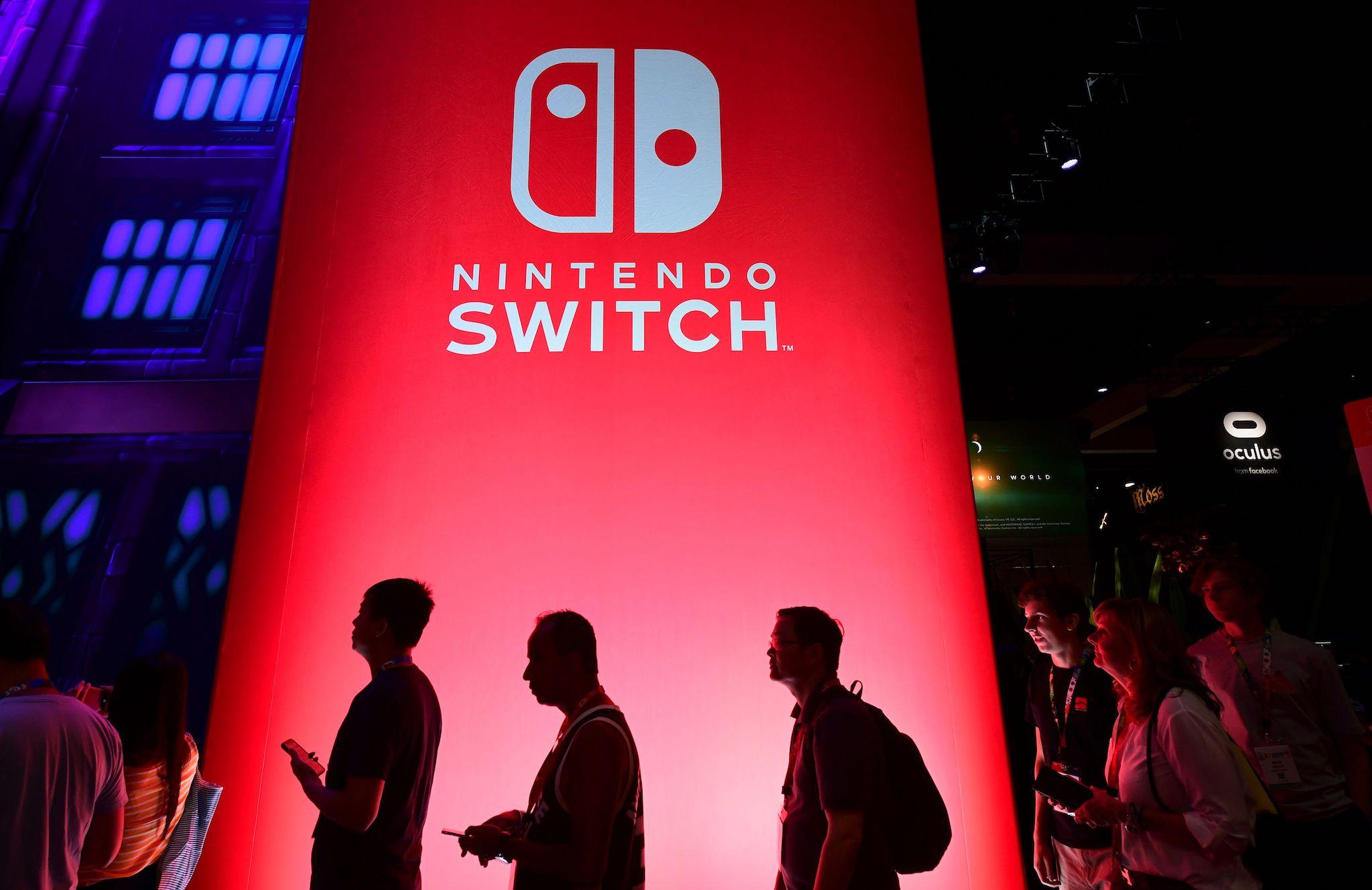 People wait in line for a chance to sample new games for Nintendo Switch at the 2019 Electronic Entertainment Expo, also known as E3, opening in Los Angeles, California on June 11, 2019