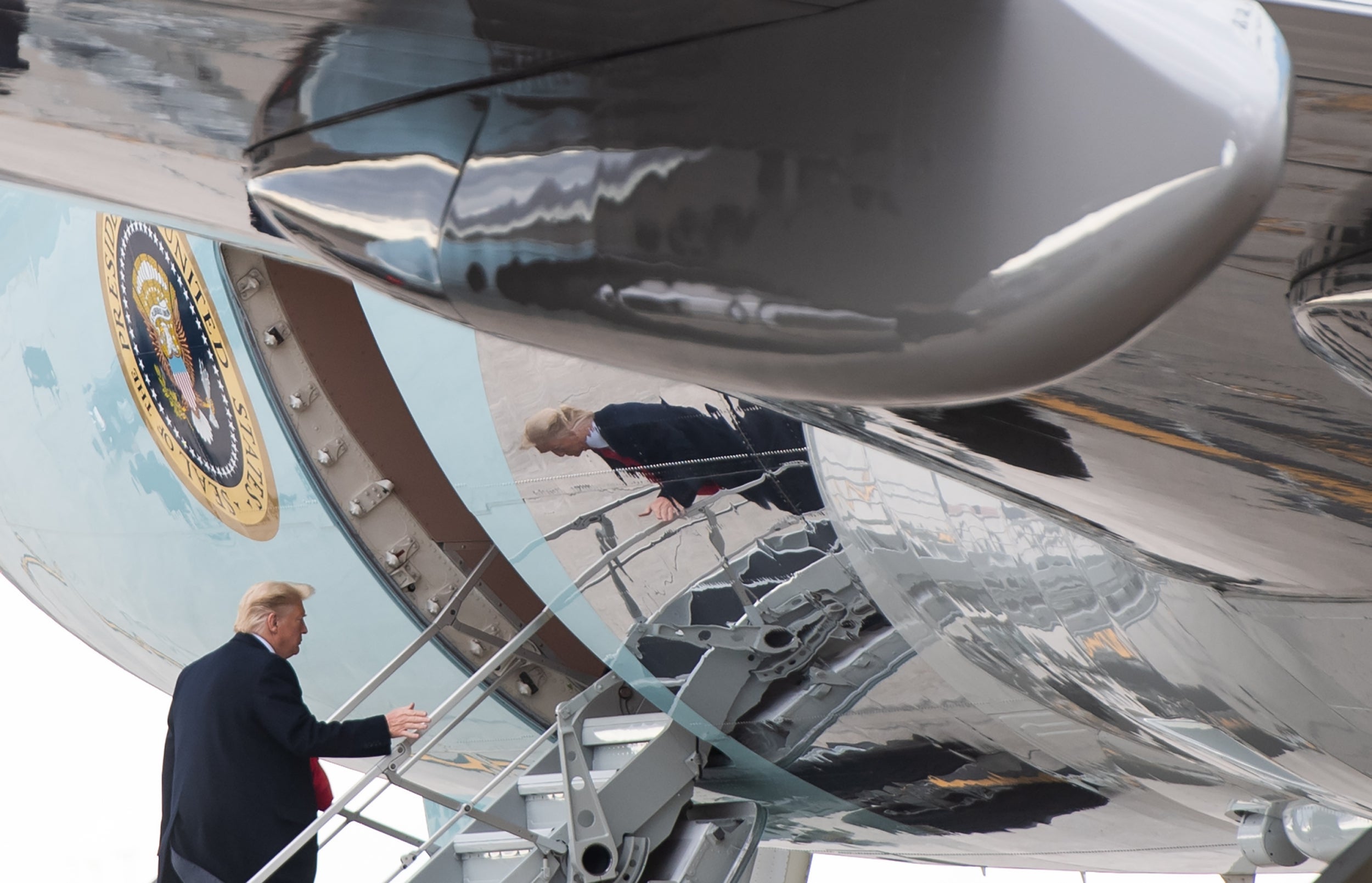 Air Force One with Trump on board nearly hit by drone, report says