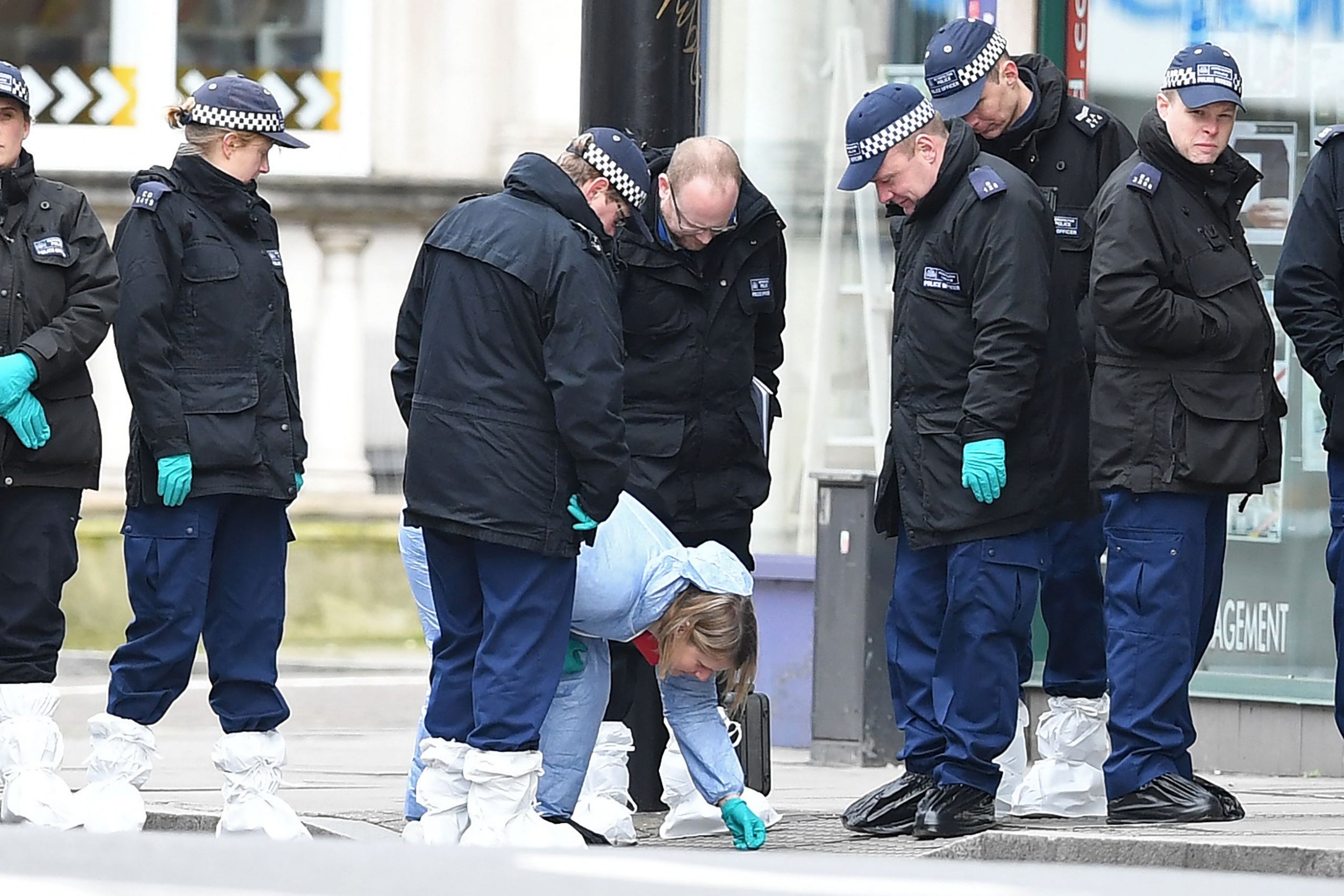 Police officers conduct a search in south London after the Streatham attack last month