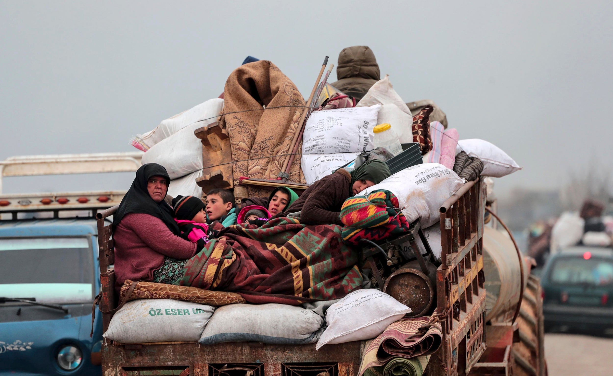 Civilians flee from Idlib earlier this month