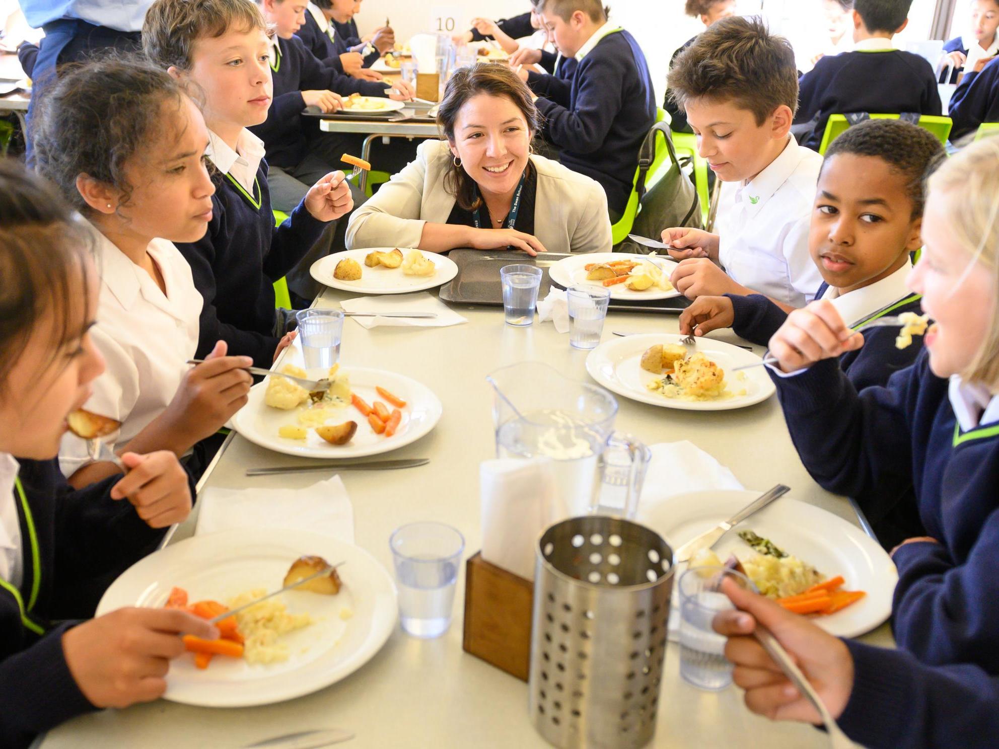 Kay Wood, headteacher of the Swan School, with pupils