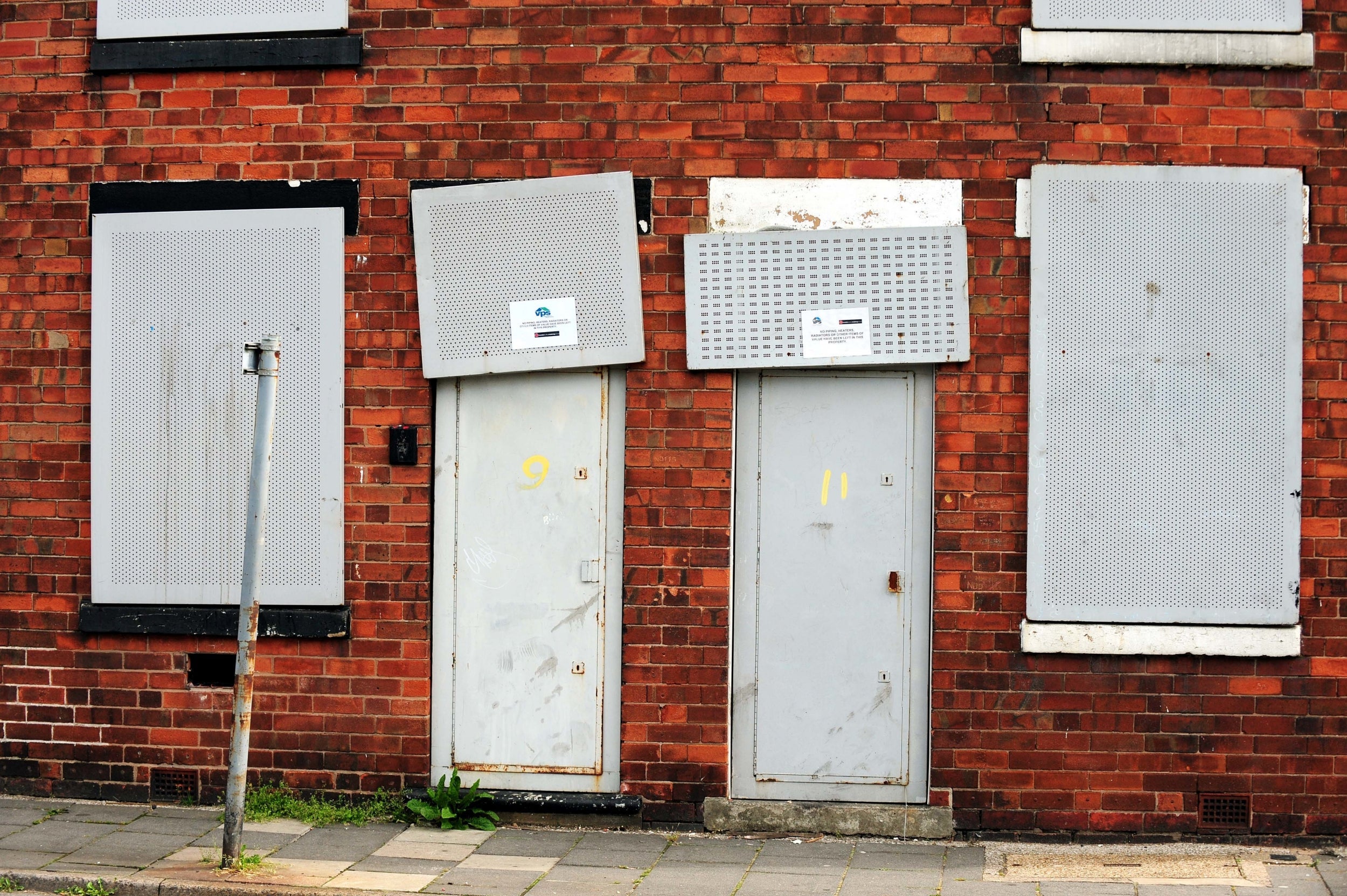 Boarded-up homes on a street in Mansfield