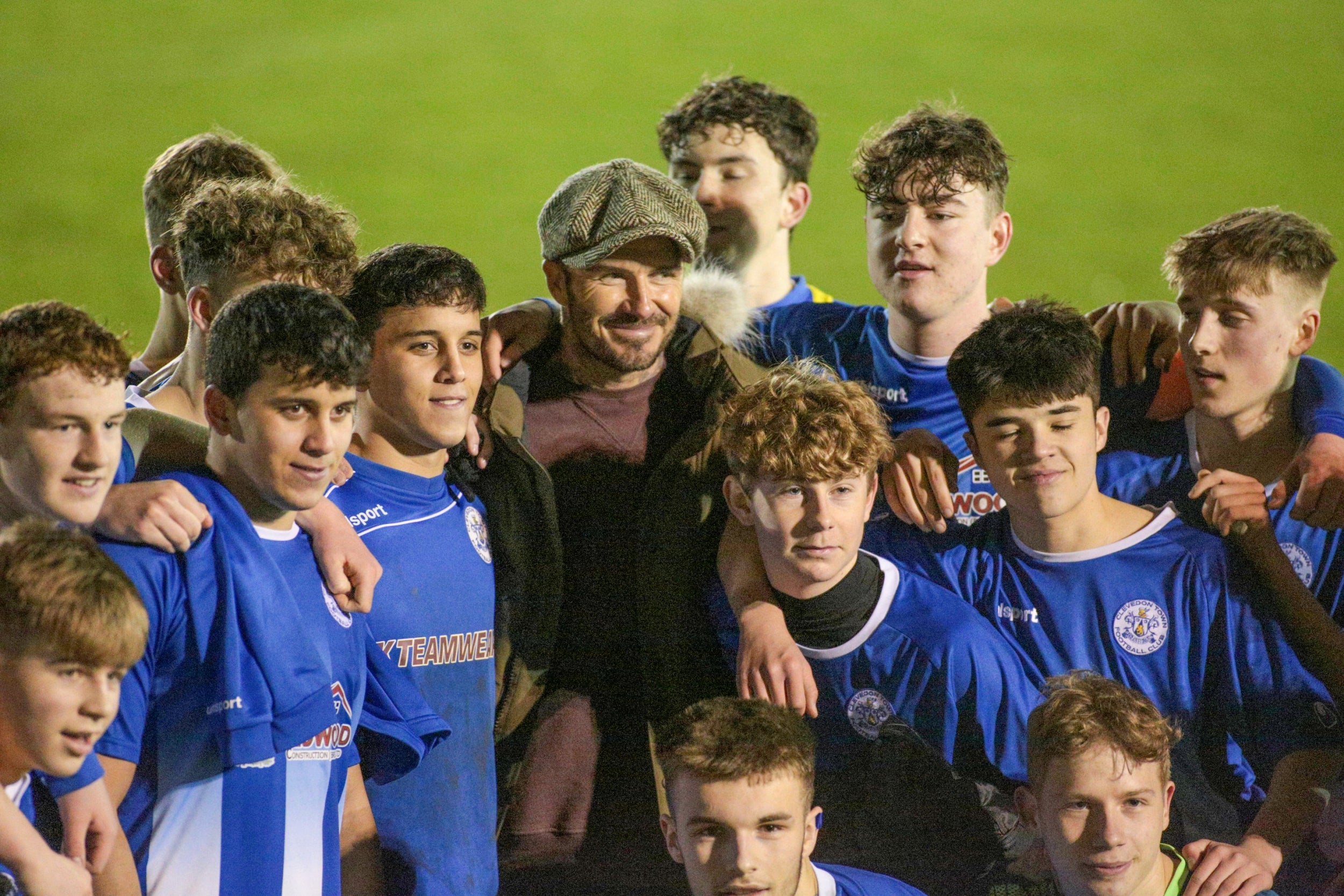 Beckham posed with the team afterwards