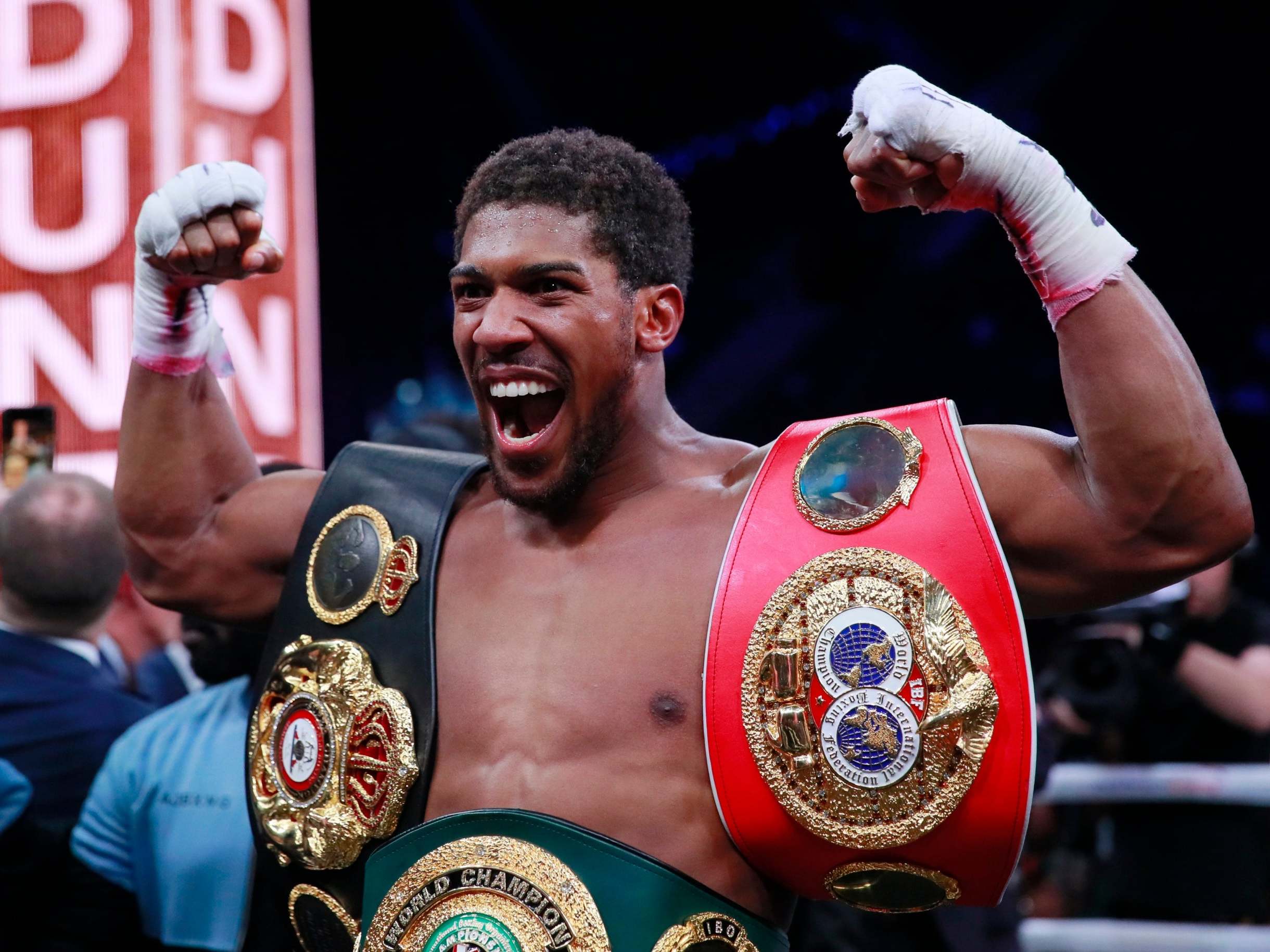 Anthony Joshua holds the remaining three heavyweight belts