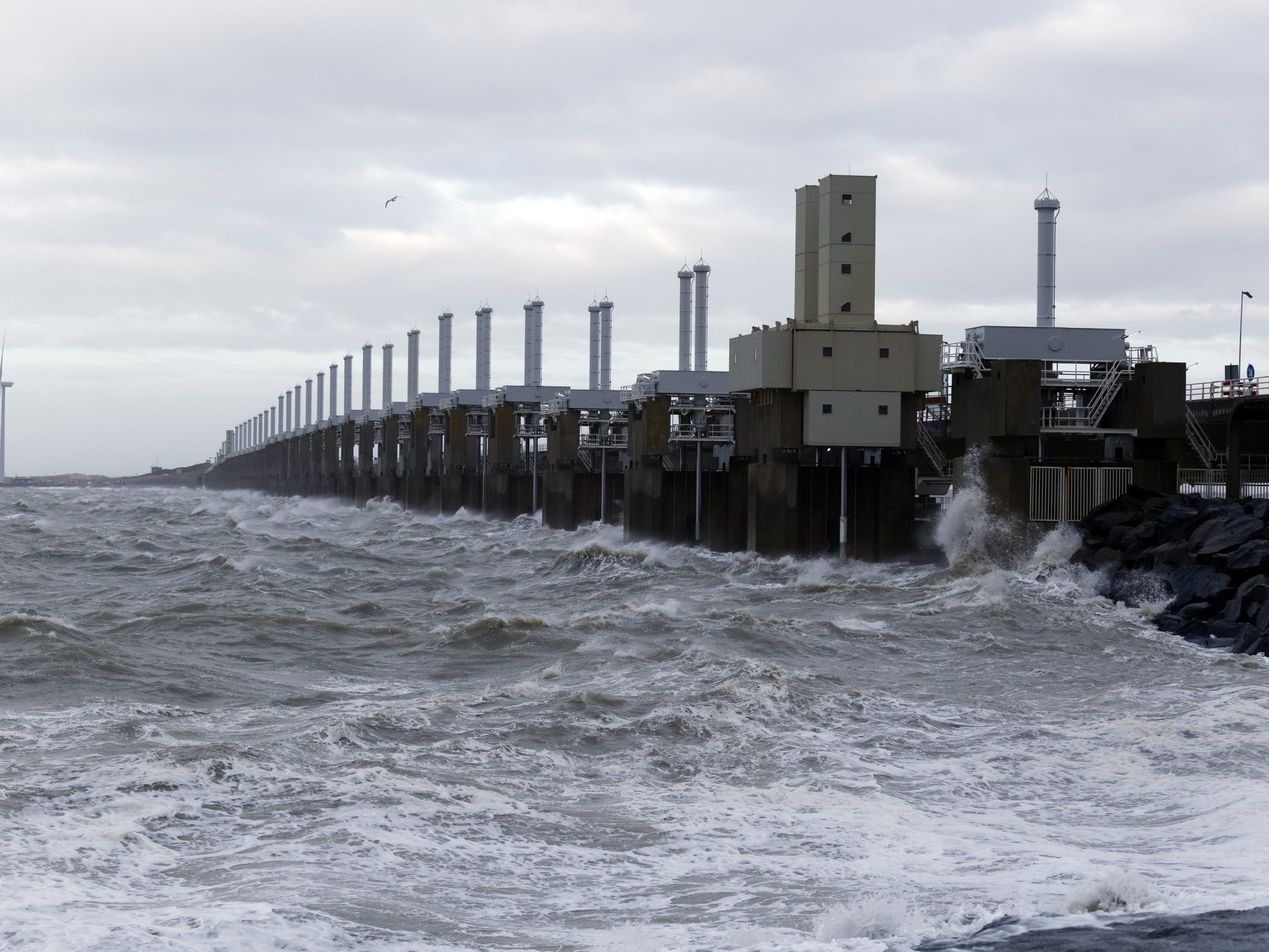 The Oosterscheldekering is the largest of thirteen existing dams and storm surge barriers, designed to protect the Netherlands from flooding from the North Sea