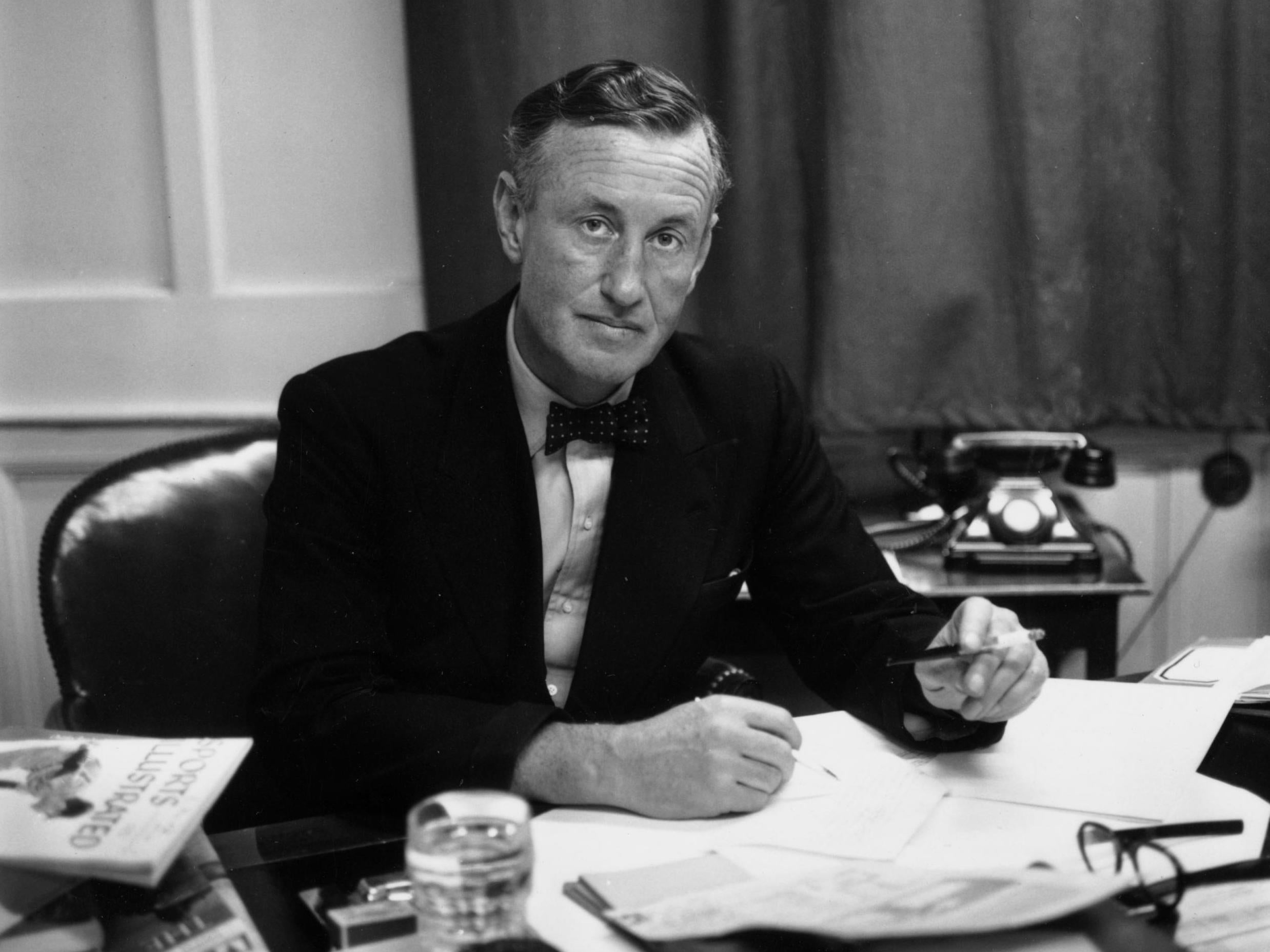 Bond creator and martini fan Ian Fleming pictured at his desk in 1958. Fleming was a regular at some of London’s finest bars, especially Dukes in St James’s