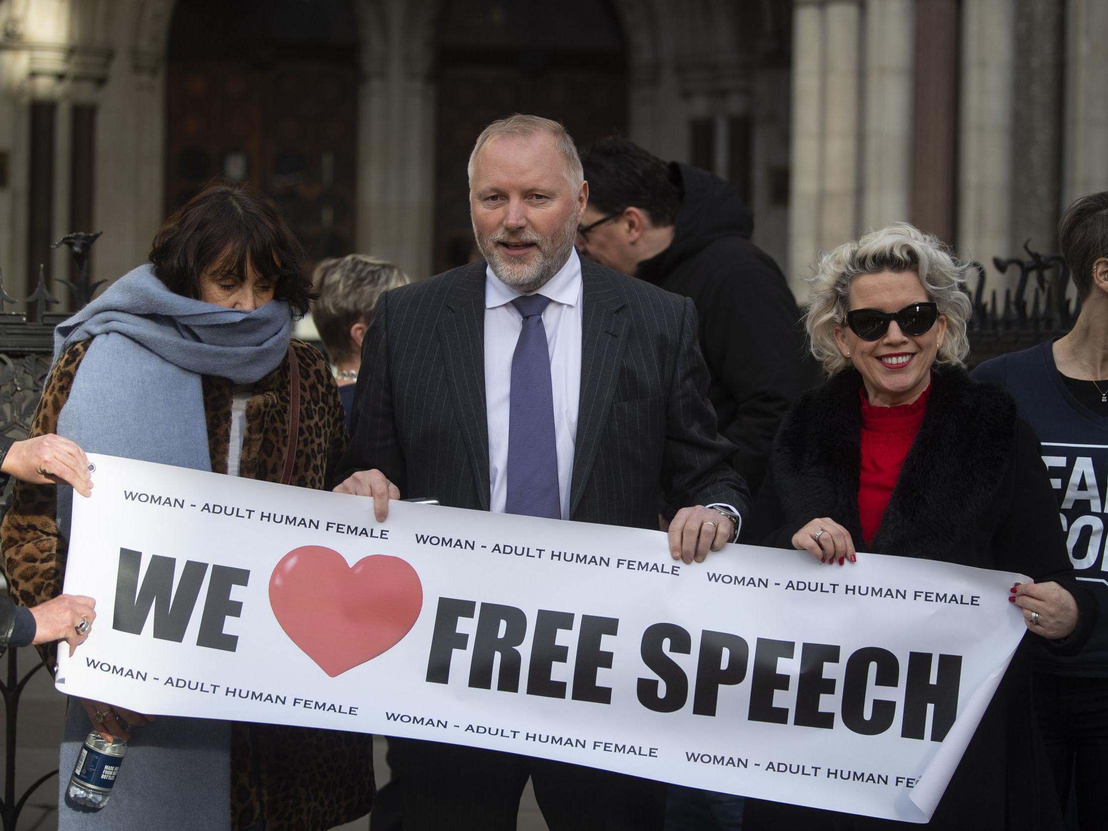 Harry Miller with supporters outside the High Court in London