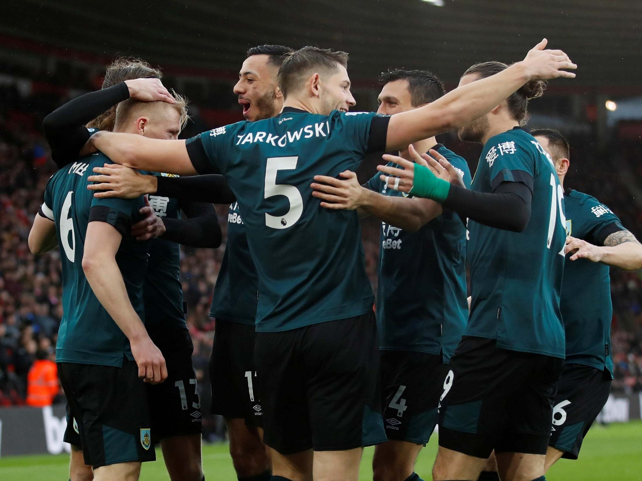 Burnley celebrate after Ashley Westwood scores just 93 seconds into the match