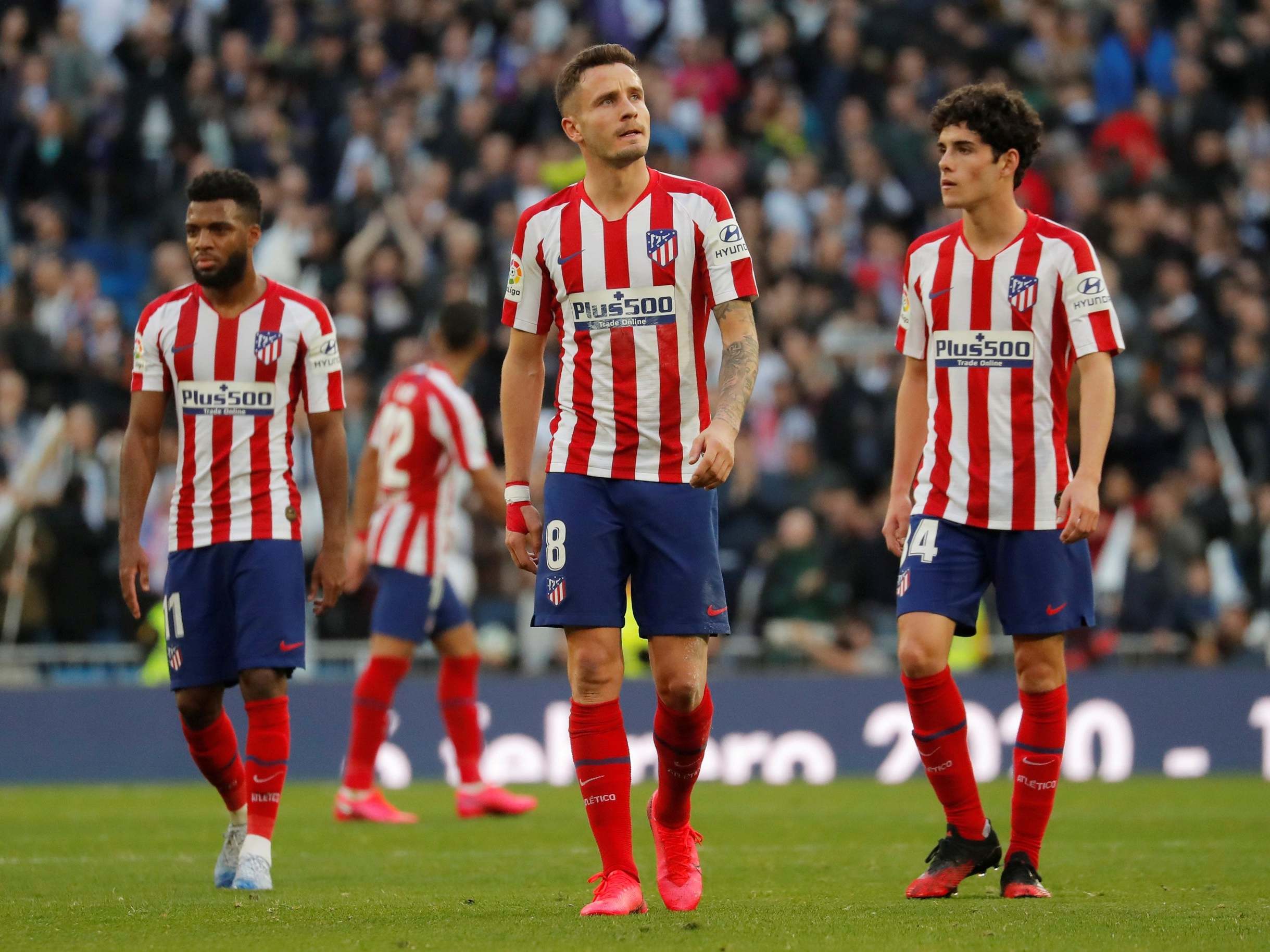 Atletico Madrid's Saul Niguez looks dejected