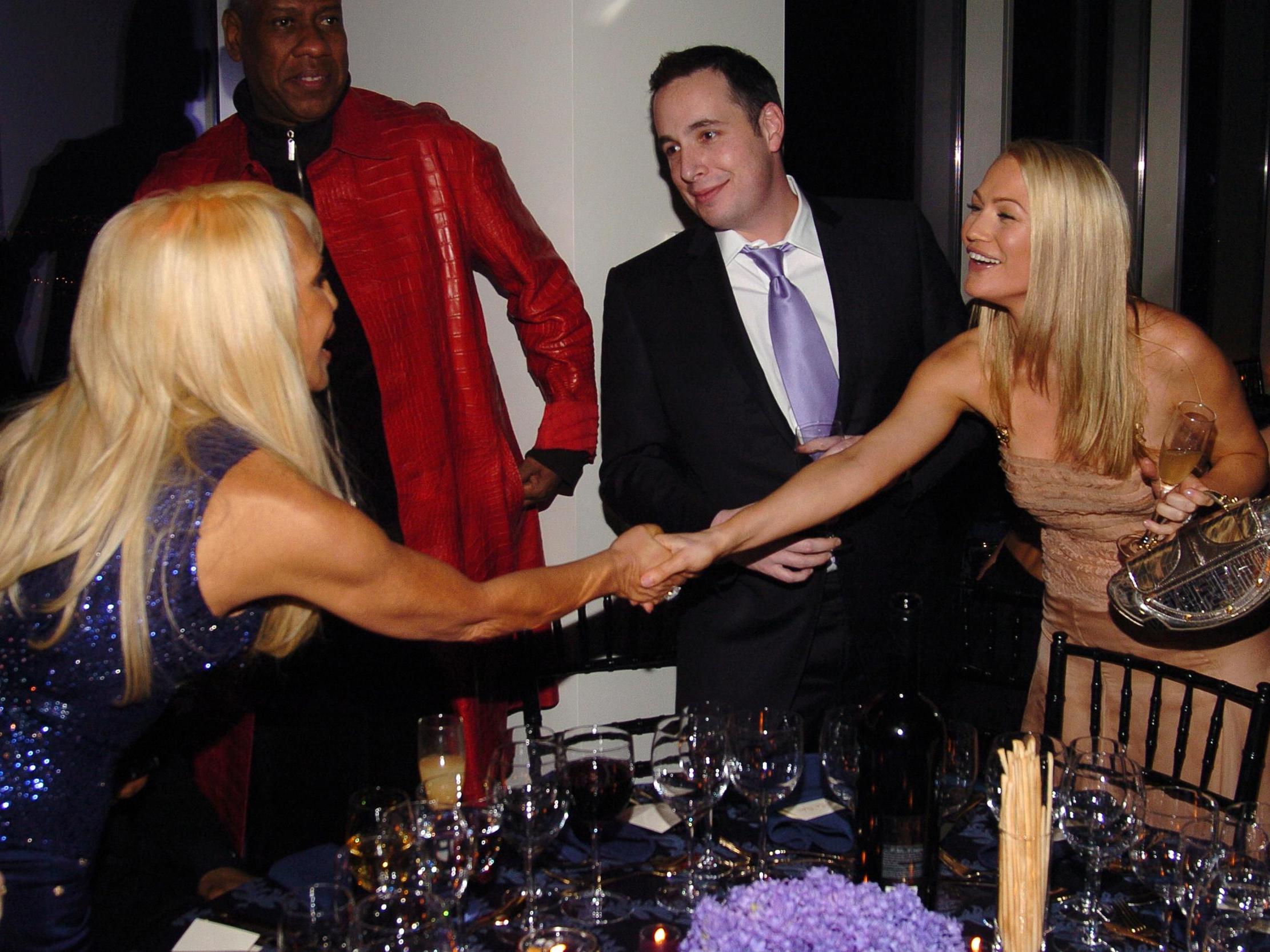 Glitz and glamour: (from left) Donatella Versace, Andre Leon Talley, Dan Peres and Sarah Wynter in 2006