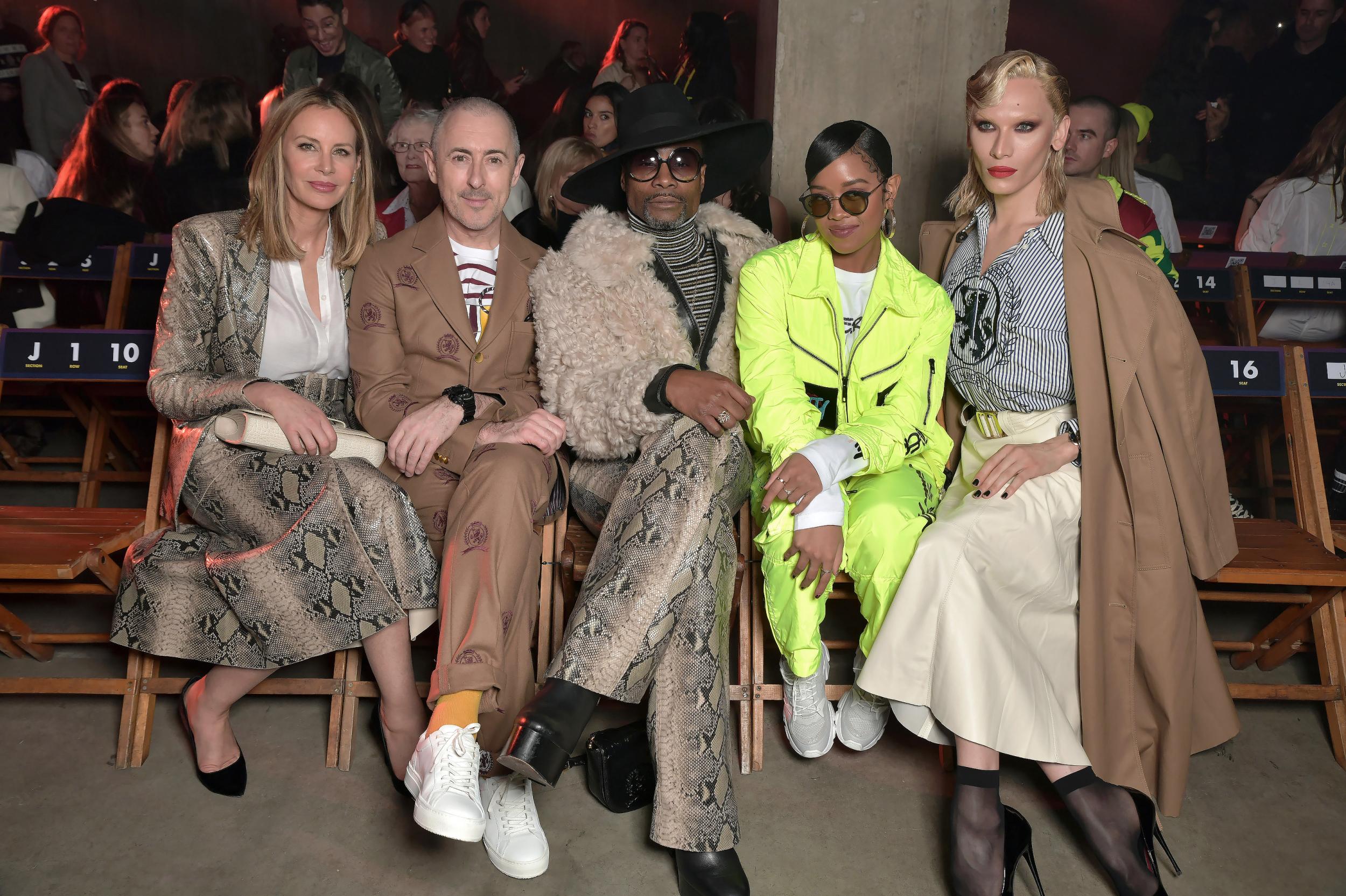 Dee Ocleppo, Alan Cumming, Billy?Porter, H.E.R and Miss Fame sit front row at Sunday’s Tommy Hilfiger show