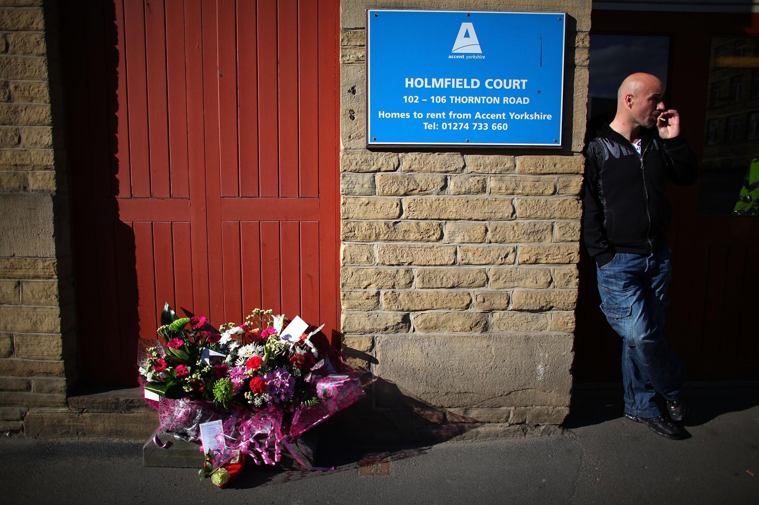 Flowers outside Holmfield Court (Getty)