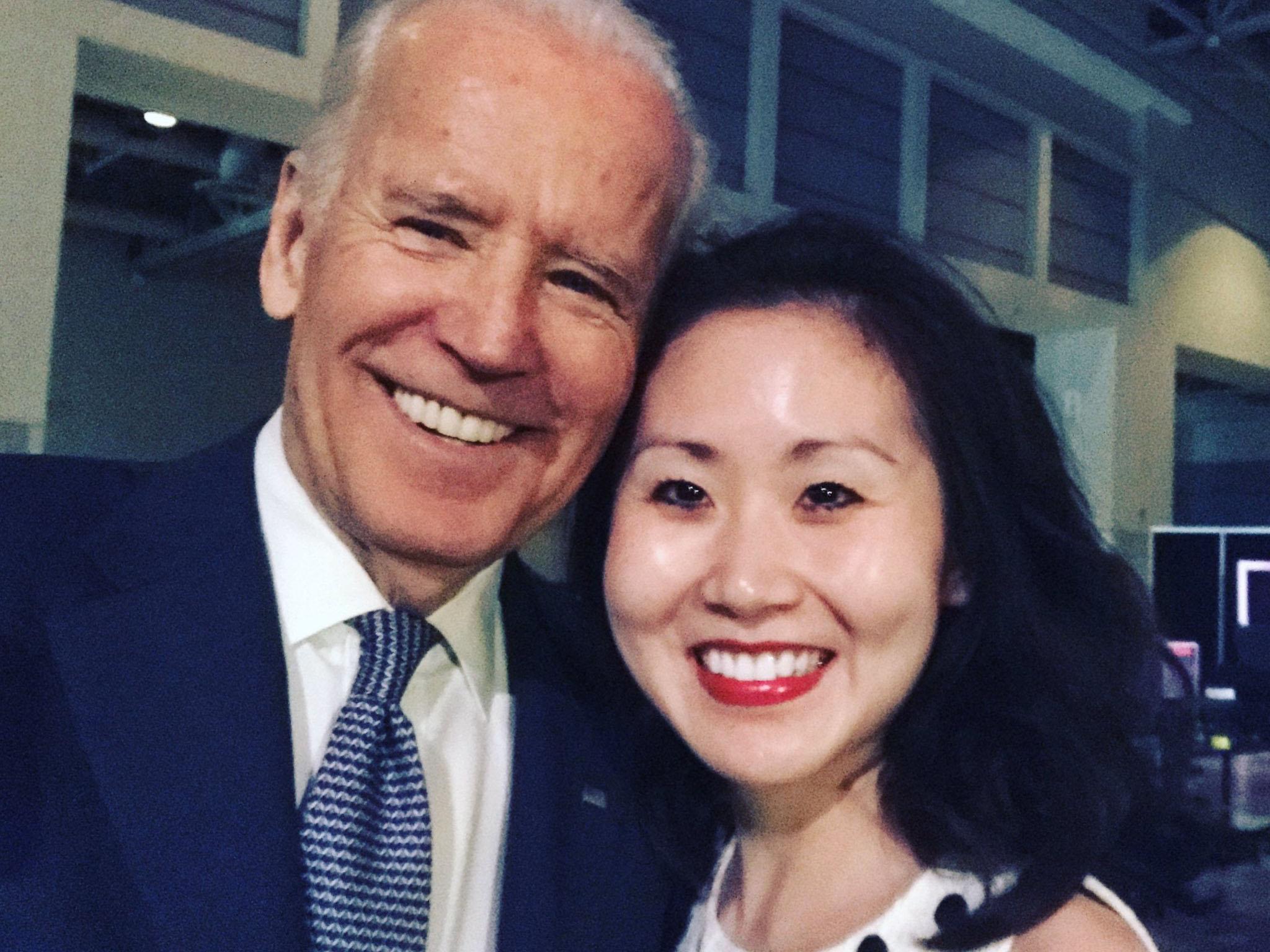 Former Young Democrat treasurer Lindy Li (pictured with Joe Biden) claims she was ousted for her anti-Bernie Sanders tweets